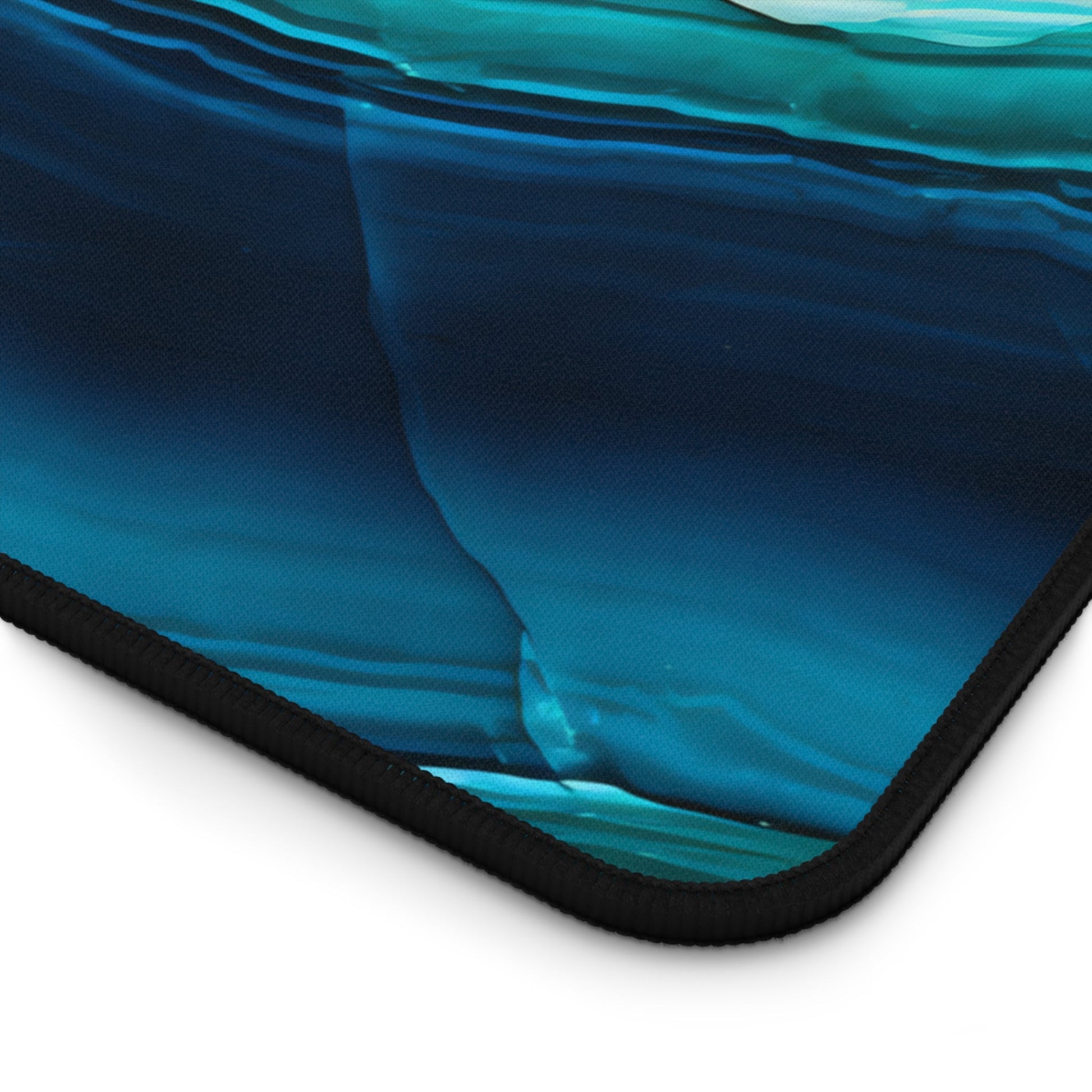 Close-up view of the front of the Cyan Blue Gemstone Pattern xxl mouse pad