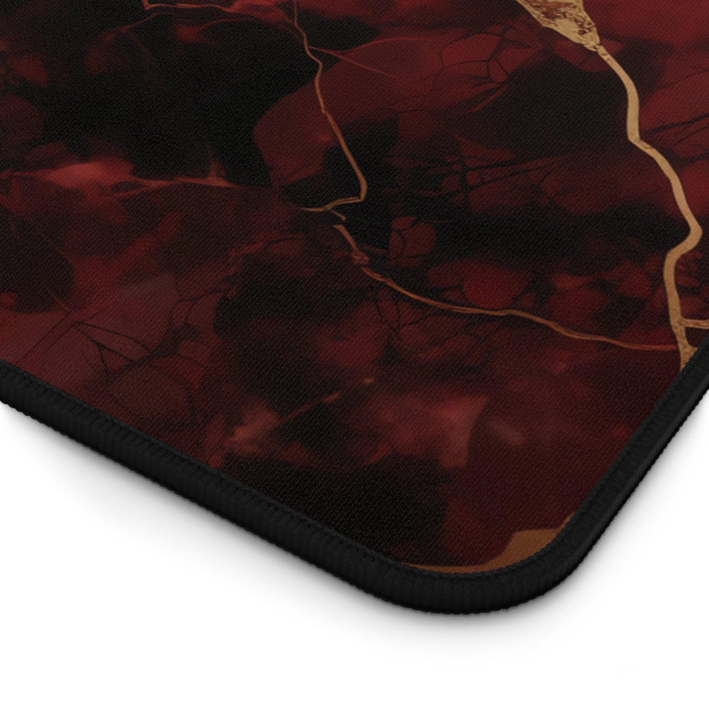 Close-up view of the front of the Rich Red, Marbled, Gold Detailing xxl mouse pad