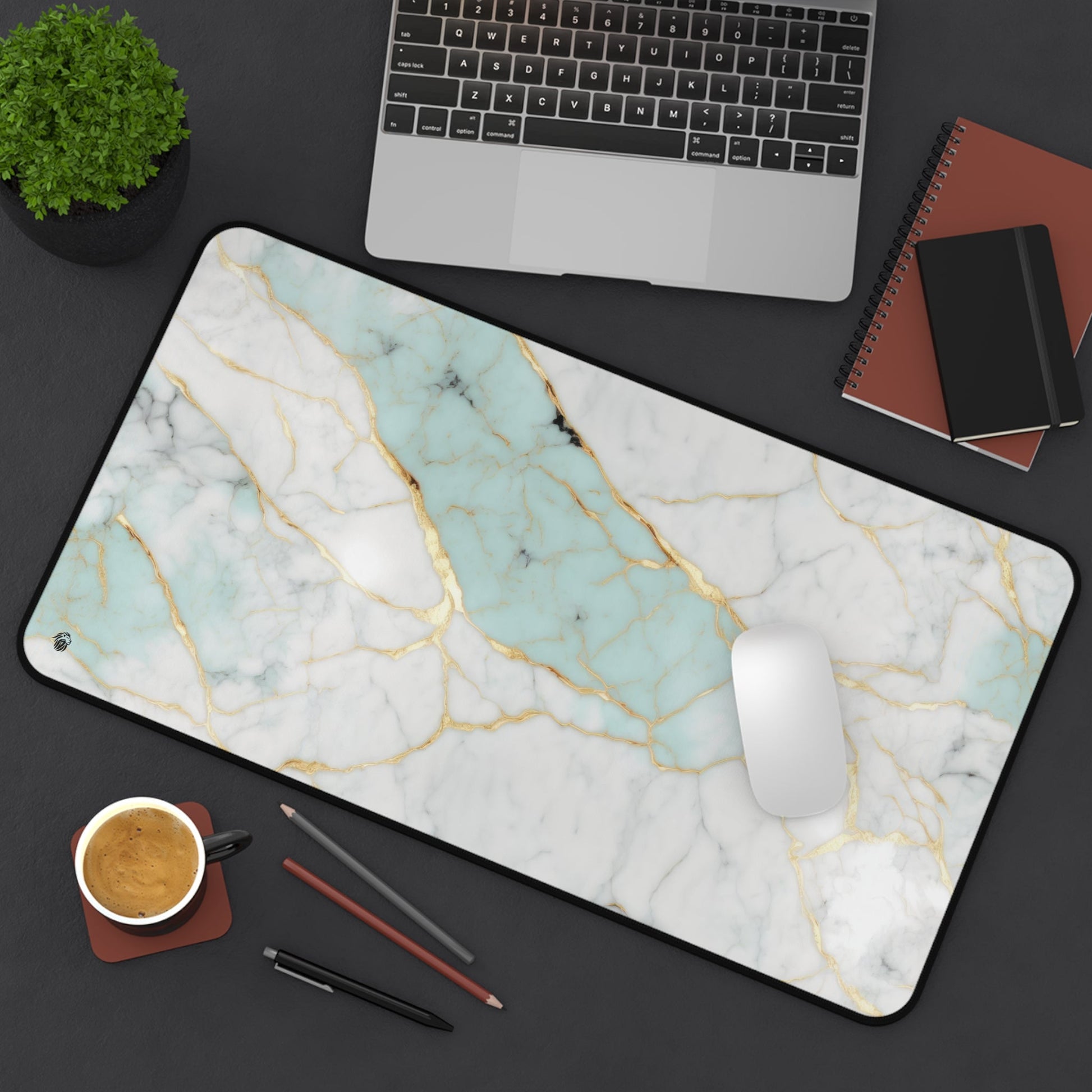 Aquamarine Marble with Gold Accents xxl mouse pad of size 12 by 22 inches displayed on a desk