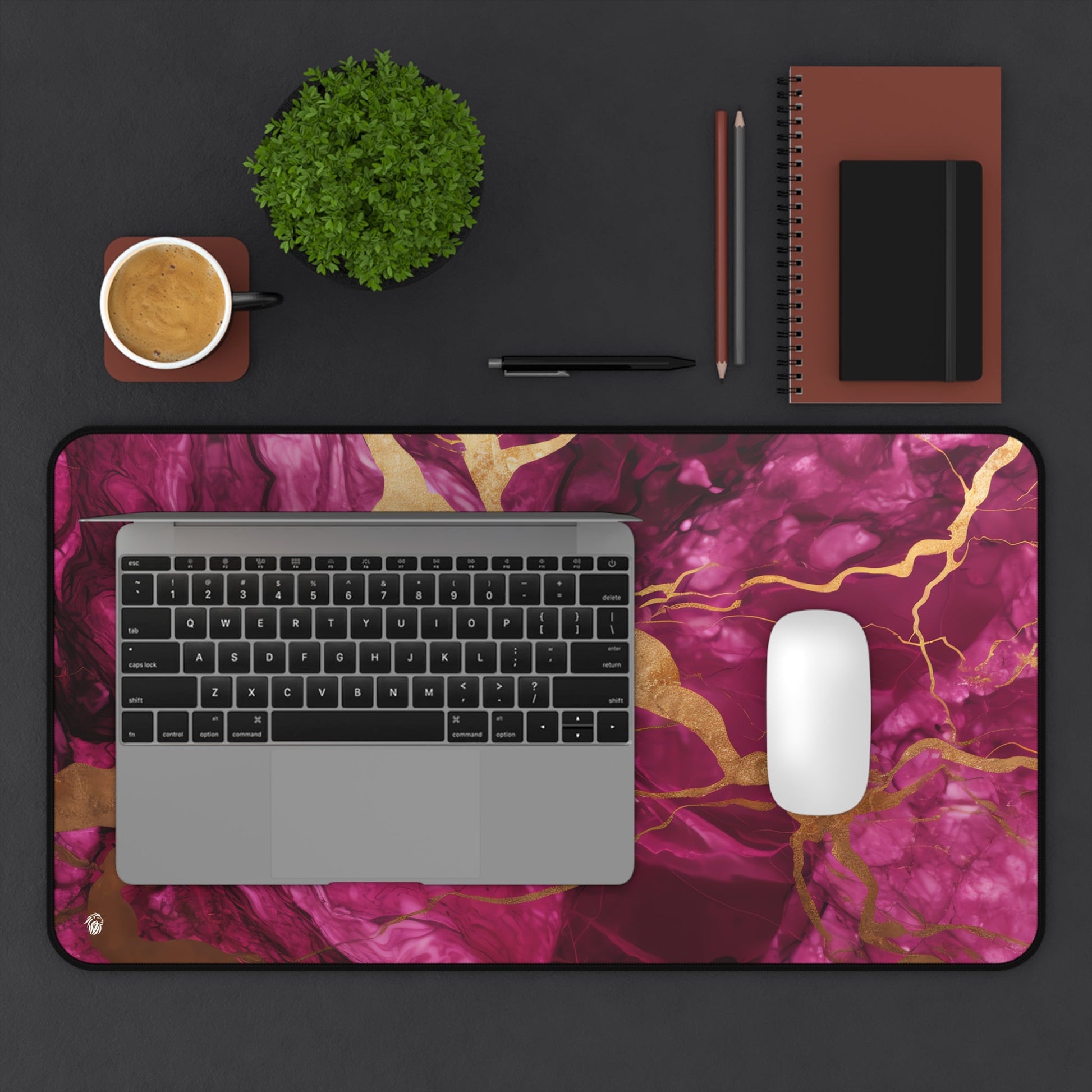 Fuchsia Marble with Gold Accents xxl mouse pad of size 12 by 22 inches displayed on a desk