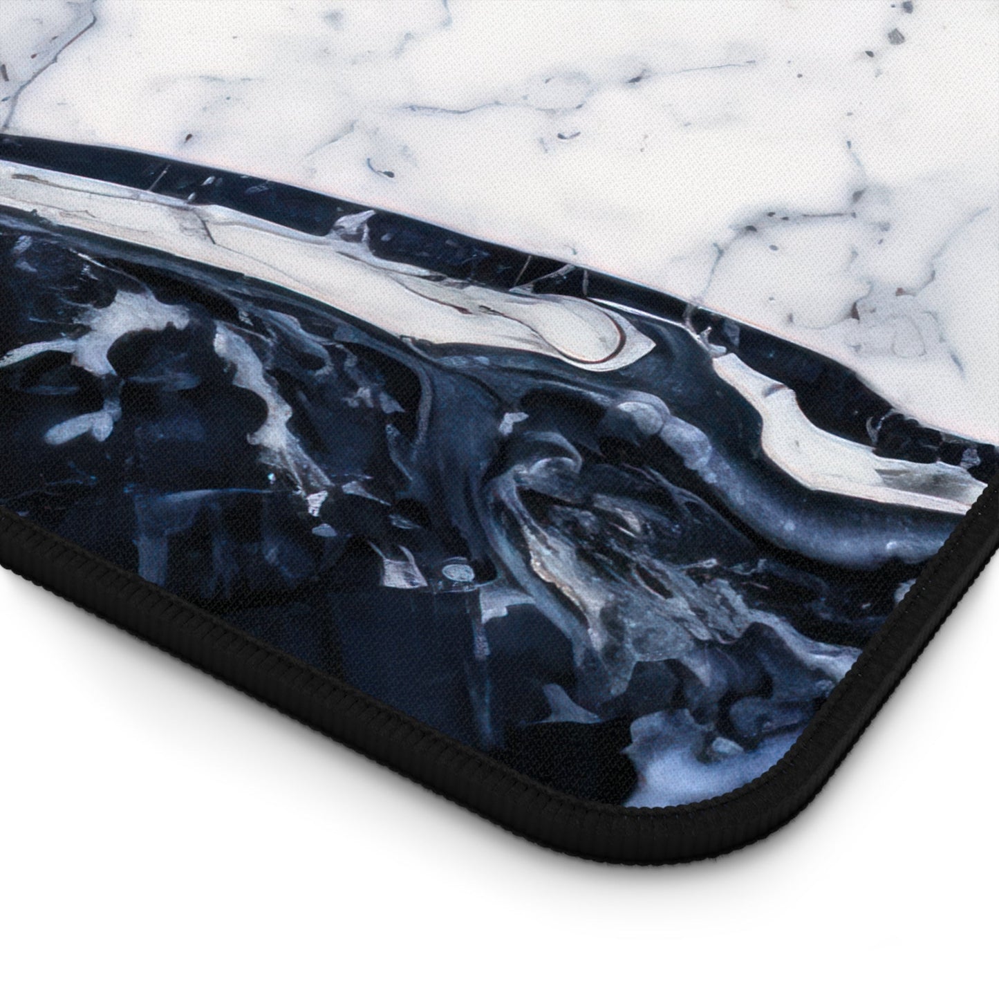 Close-up view of the front of the Deep Blue Marbled Appearance xxl mouse pad