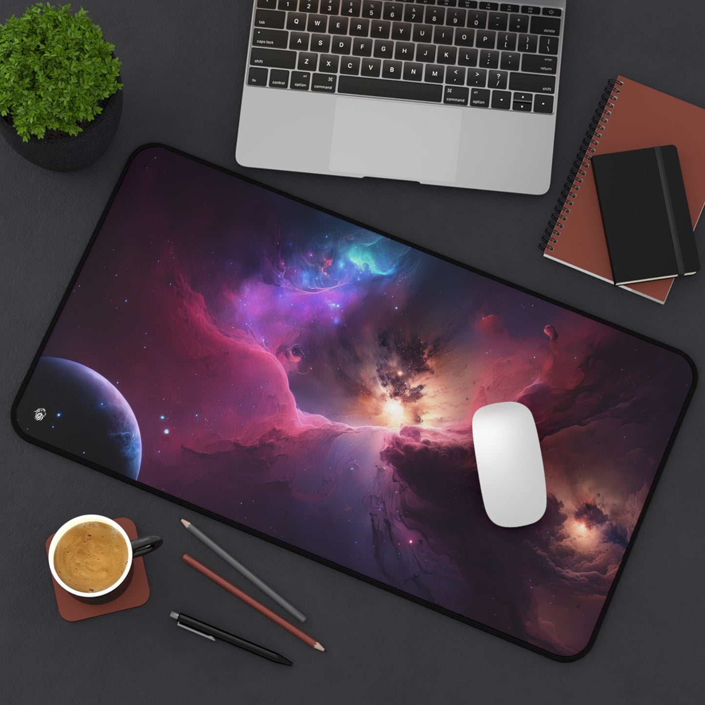 Vibrant Nebula Imagery xxl mouse pad of size 12 by 22 inches displayed on a desk