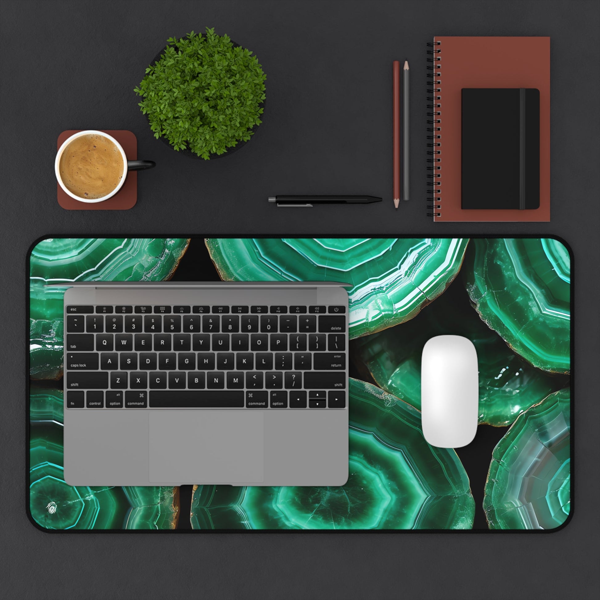 Deep Green, Emerald Crystal Geode xxl mouse pad of size 12 by 22 inches displayed on a desk