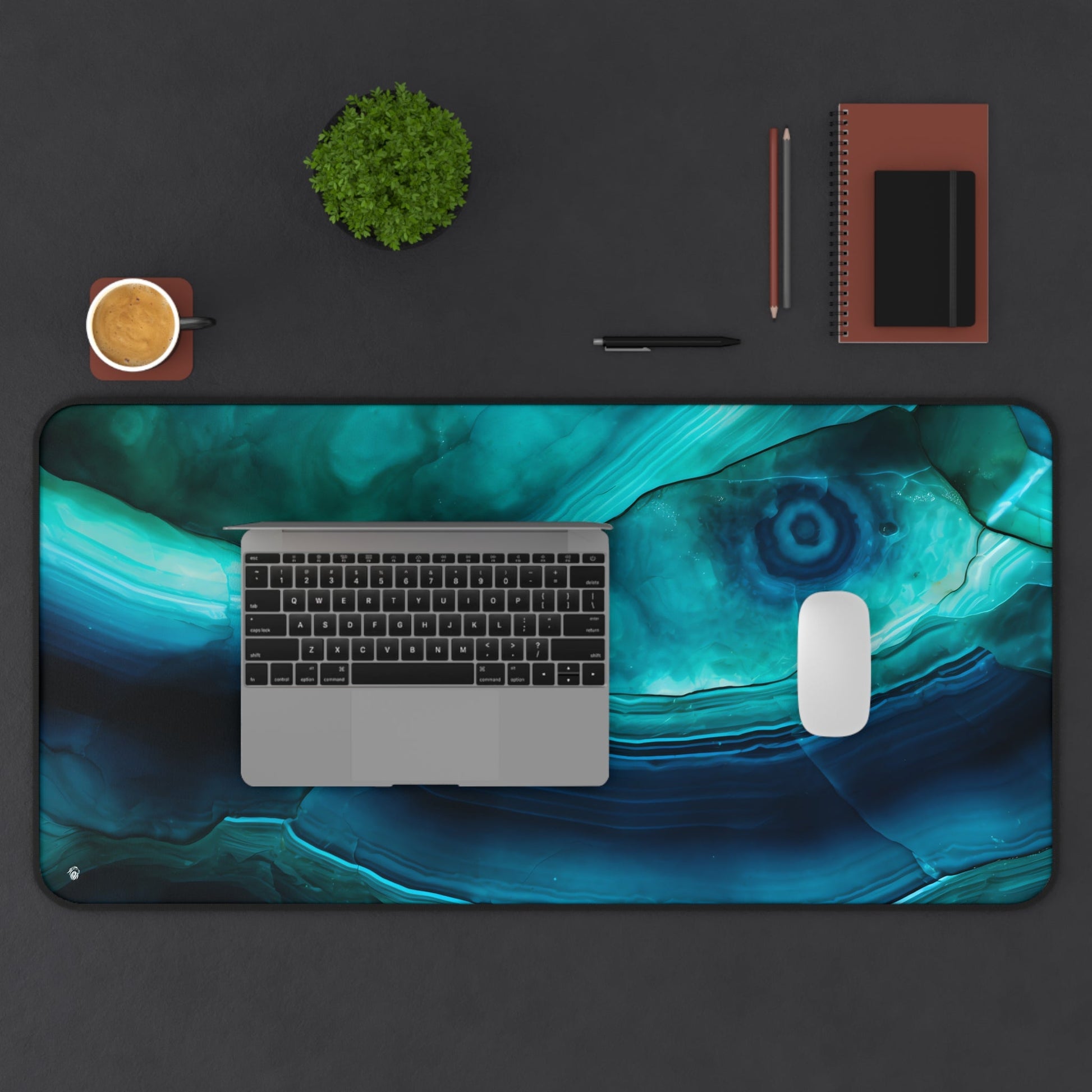 Cyan Blue Gemstone Pattern xxl mouse pad of size 15 by 31 inches displayed on a desk