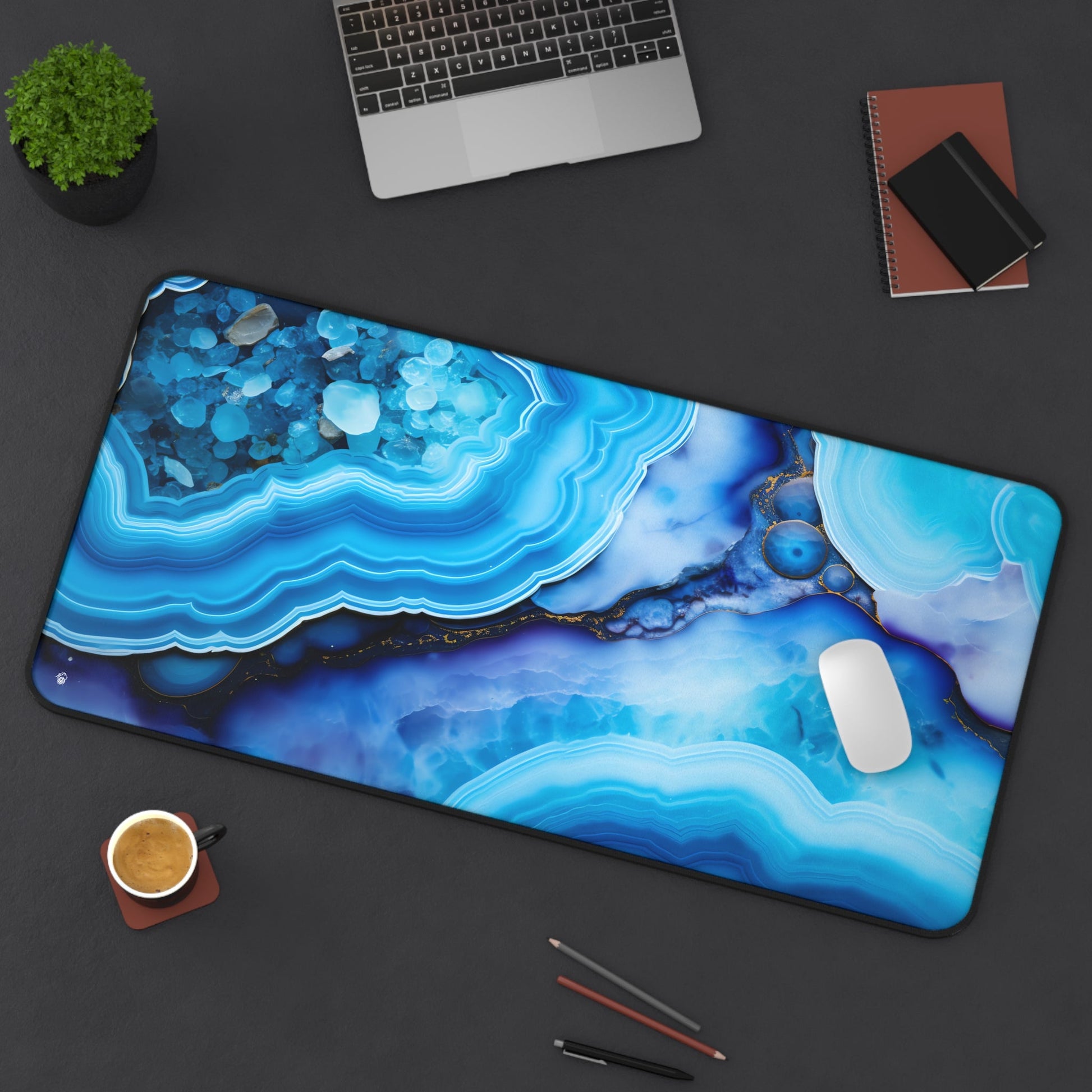 Vibrant Blue Mineral Abstract xxl mouse pad of size 15 by 31 inches displayed on a desk