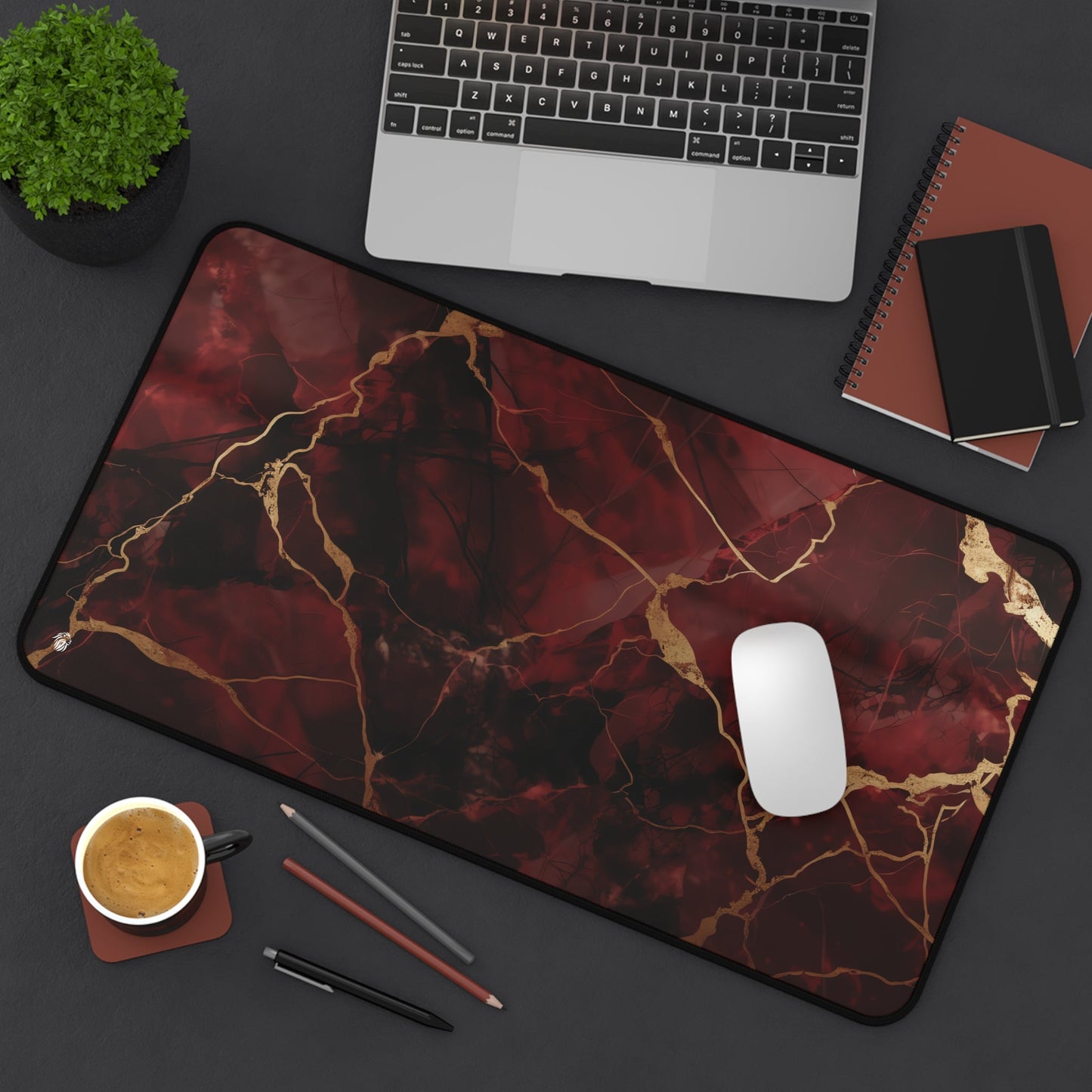 Rich Red, Marbled, Gold Detailing xxl mouse pad of size 12 by 22 inches displayed on a desk