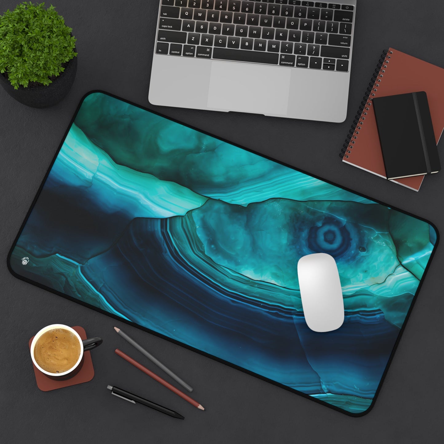 Cyan Blue Gemstone Pattern xxl mouse pad of size 12 by 22 inches displayed on a desk