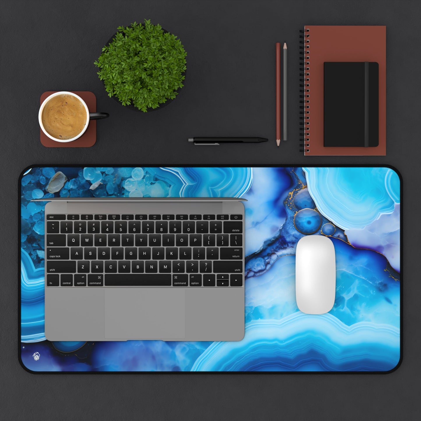 Vibrant Blue Mineral Abstract xxl mouse pad of size 12 by 22 inches displayed on a desk