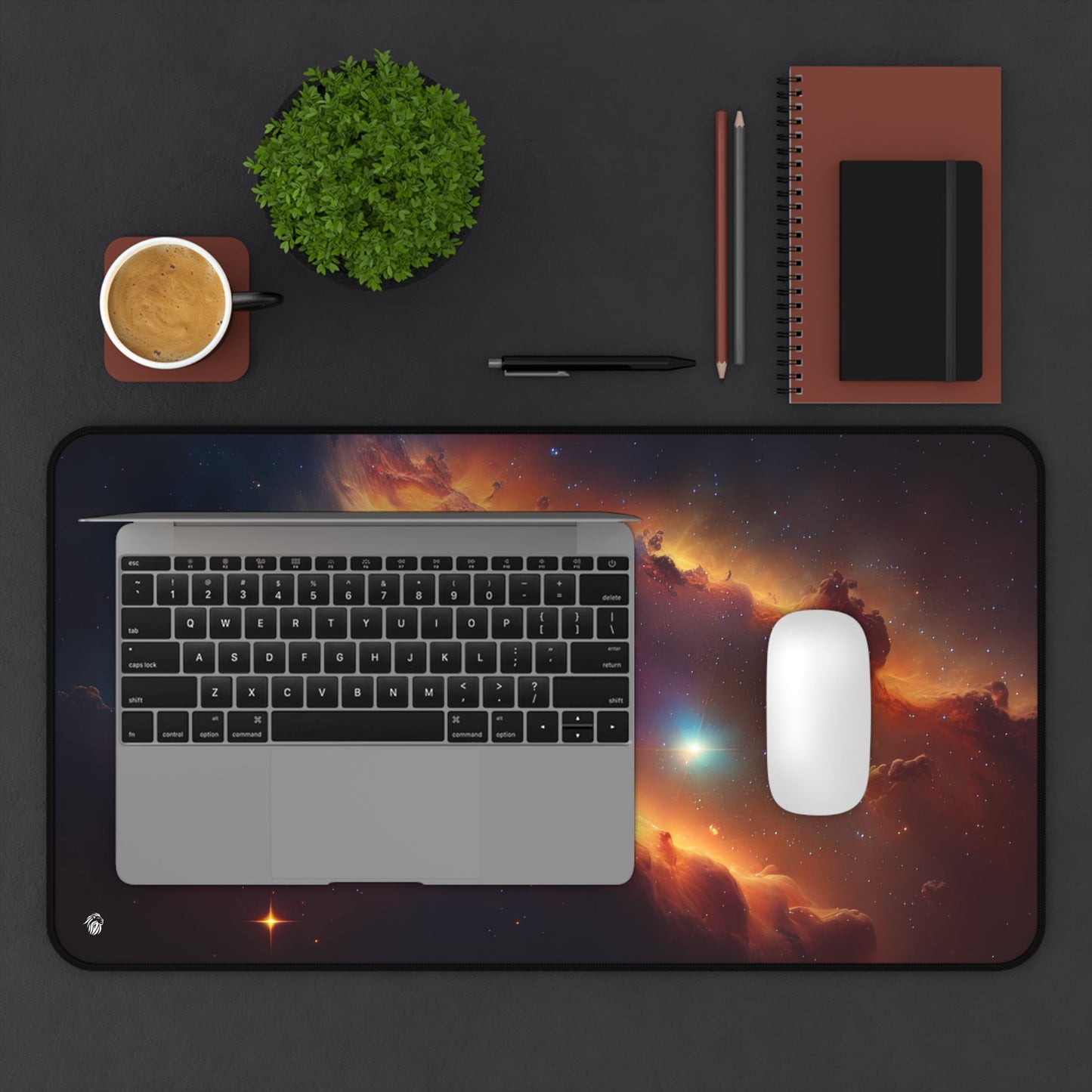 Vibrant Orange Galactic Print xxl mouse pad of size 12 by 22 inches displayed on a desk