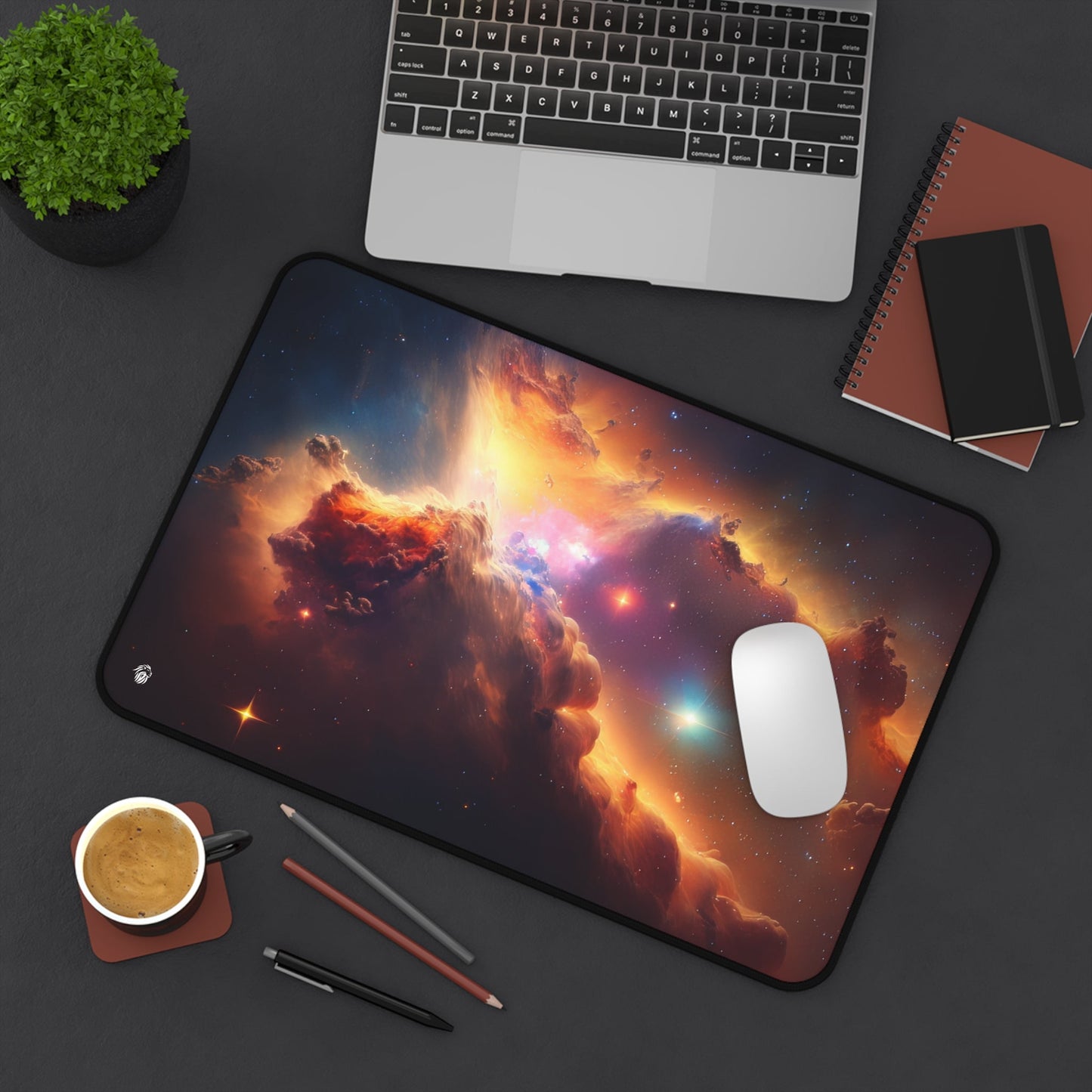 Vibrant Orange Galactic Print xxl mouse pad of size 12 by 18 inches displayed on a desk