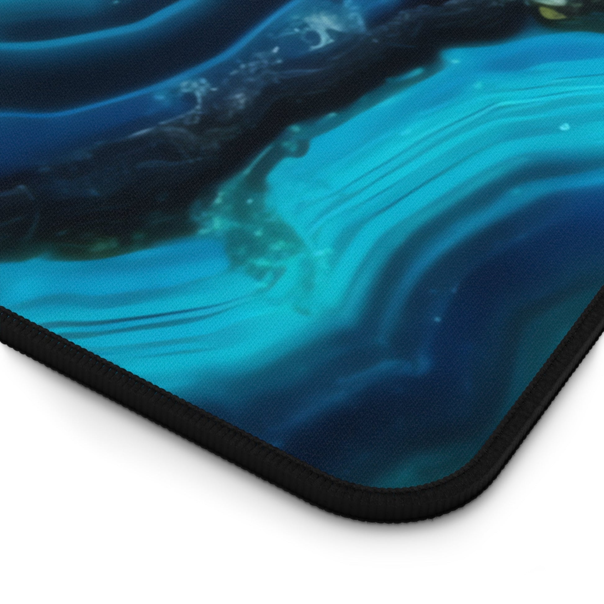 Close-up view of the front of the Vibrant Cyan Blue Geode xxl mouse pad