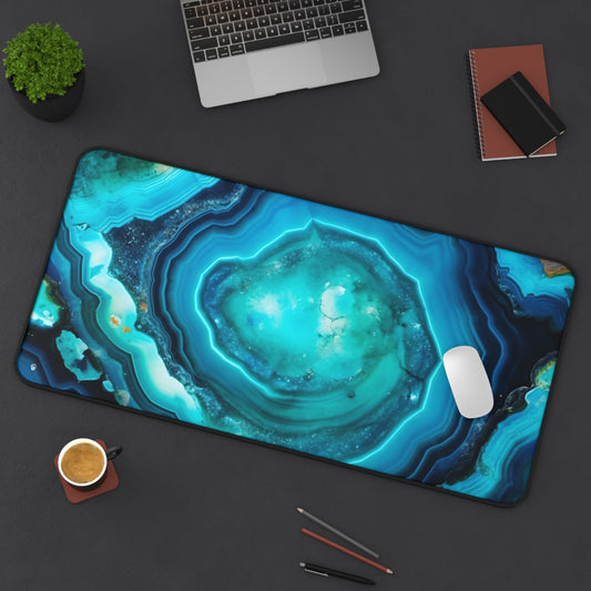 Vibrant Cyan Blue Geode xxl mouse pad of size 15 by 31 inches displayed on a desk