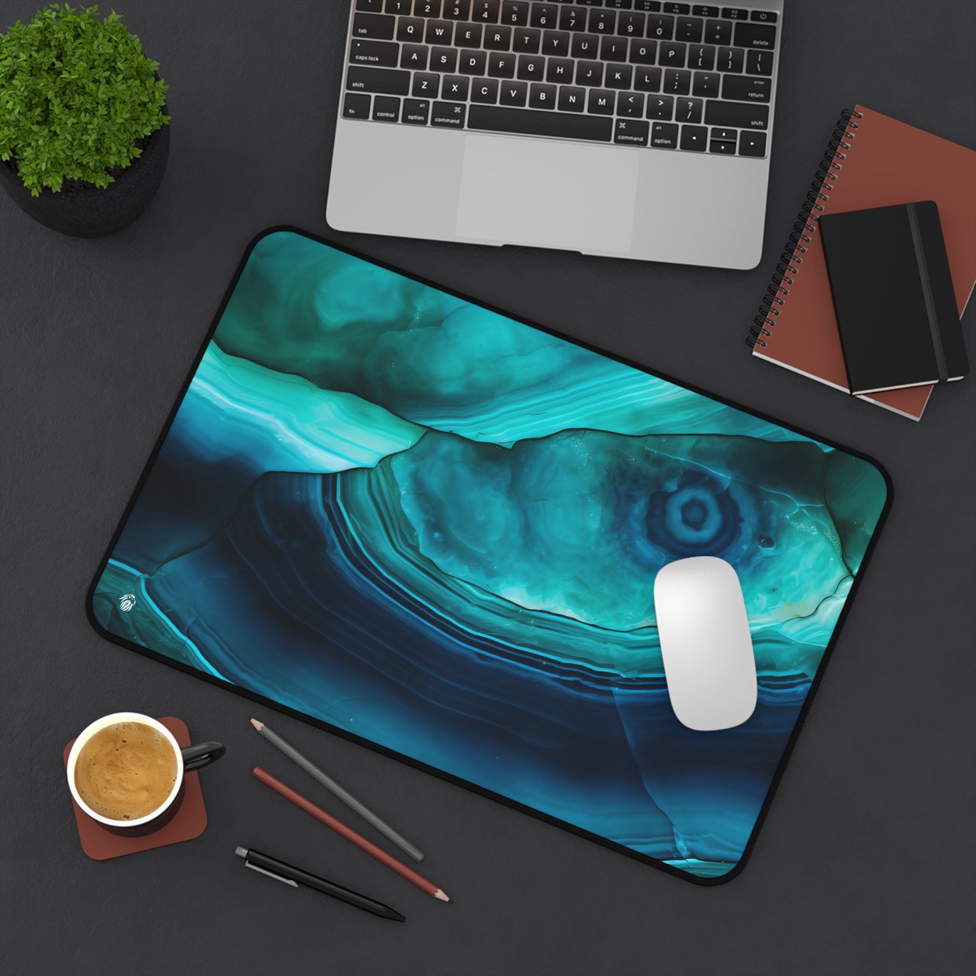 Cyan Blue Gemstone Pattern xxl mouse pad of size 12 by 18 inches displayed on a desk