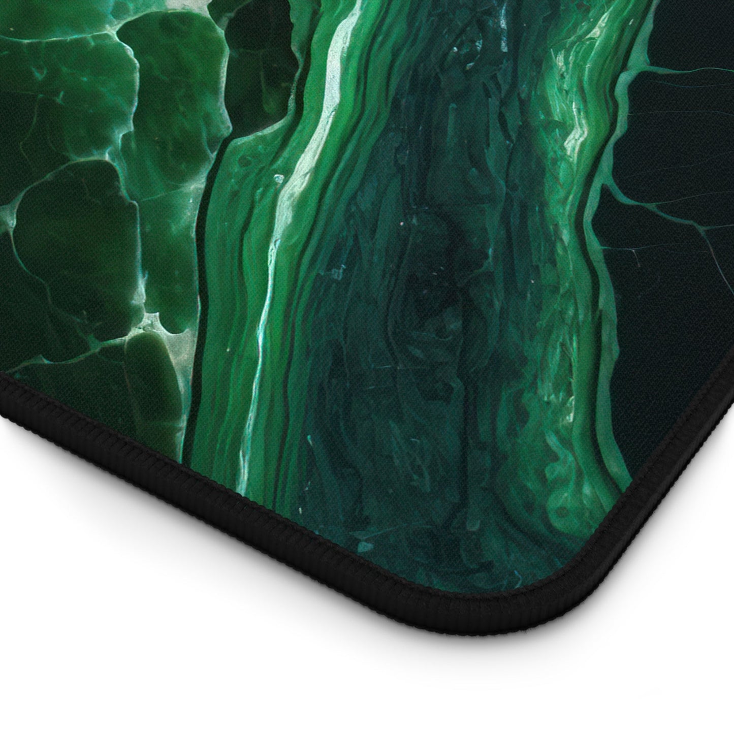 Close-up view of the front of the Elegant Emerald Green Marble xxl mouse pad