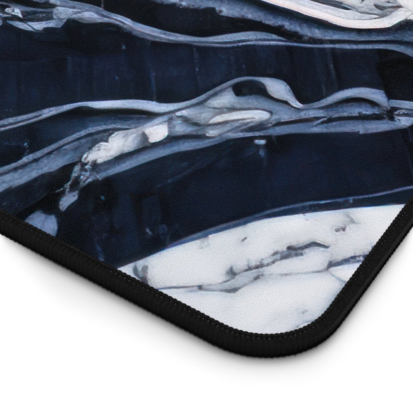 Close-up view of the front of the Deep Blue Marbled Appearance xxl mouse pad