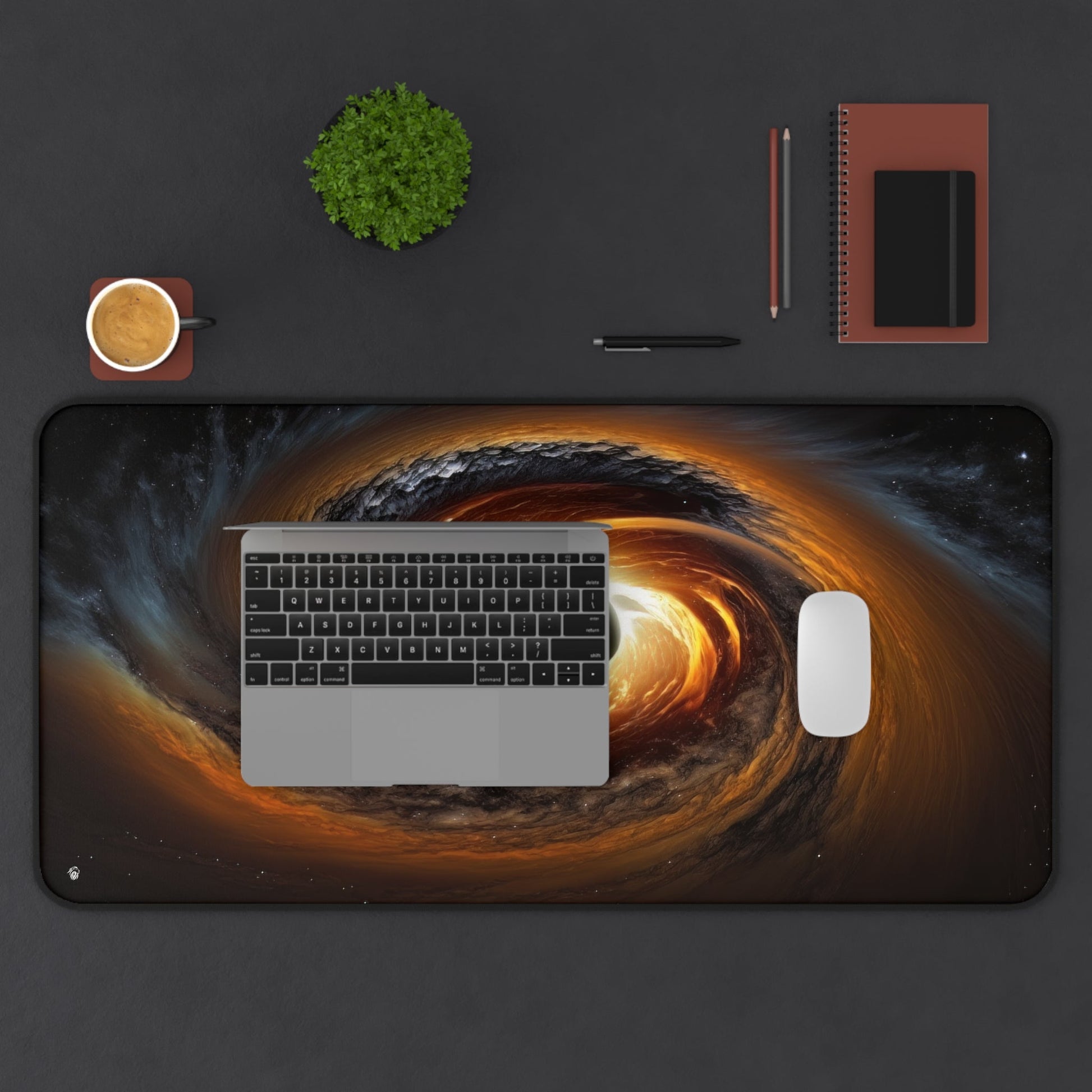 Galactic Black Hole Imagery xxl mouse pad of size 15 by 31 inches displayed on a desk