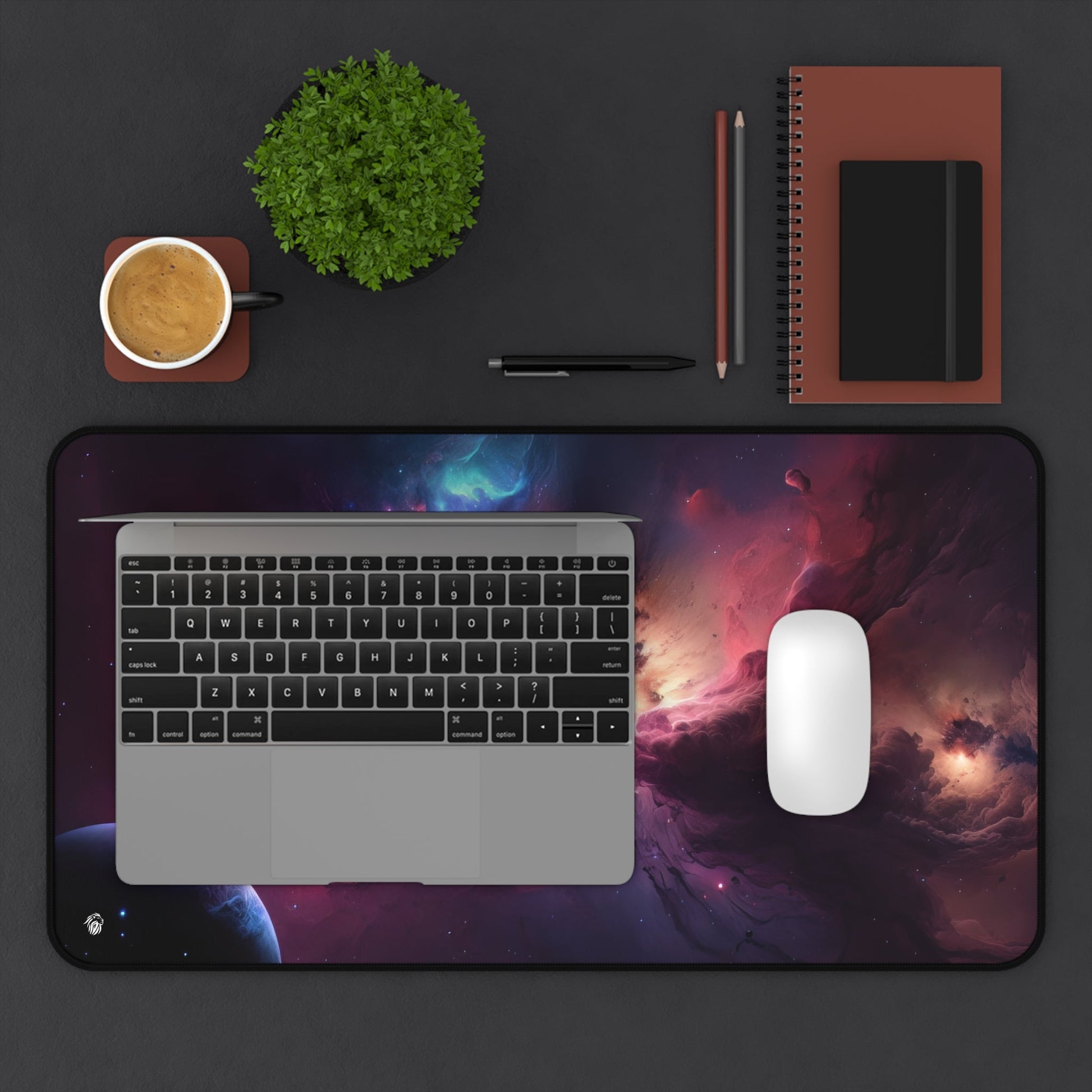 Vibrant Nebula Imagery xxl mouse pad of size 12 by 22 inches displayed on a desk