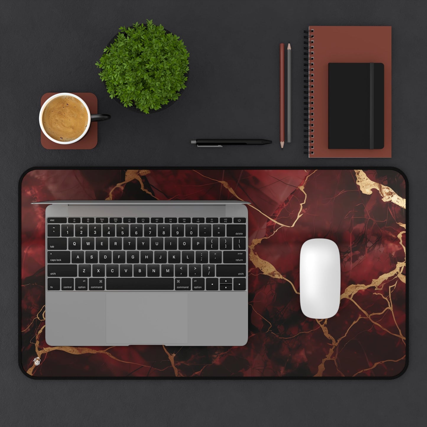 Rich Red, Marbled, Gold Detailing xxl mouse pad of size 12 by 22 inches displayed on a desk