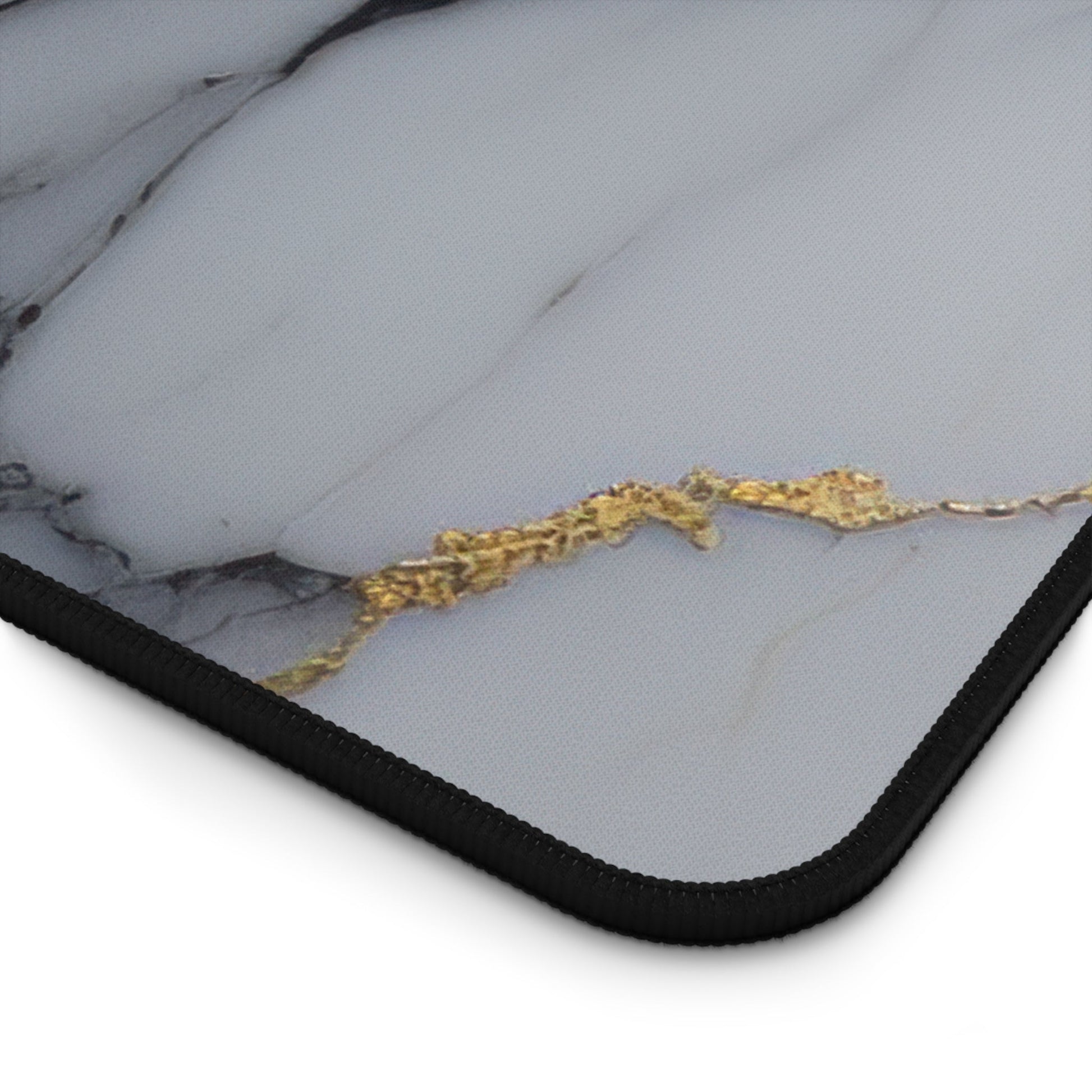 Close-up view of the front of the Purple Marble with Gold Accents xxl mouse pad