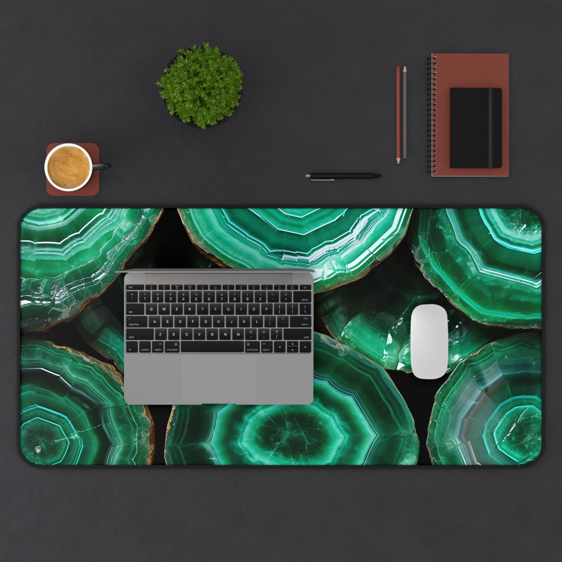 Deep Green, Emerald Crystal Geode xxl mouse pad of size 15 by 31 inches displayed on a desk