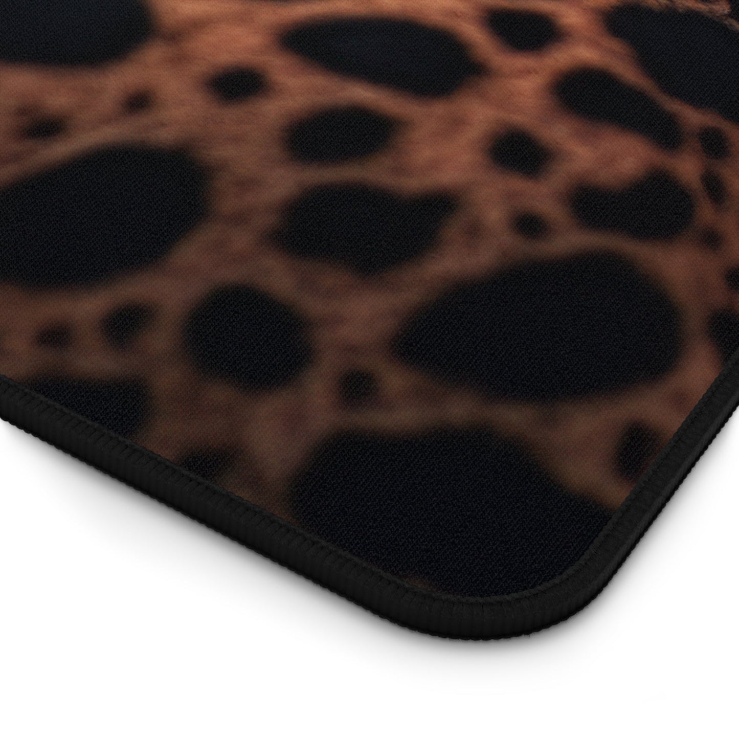 Close-up view of the front of the Exotic Cheetah Pattern xxl mouse pad