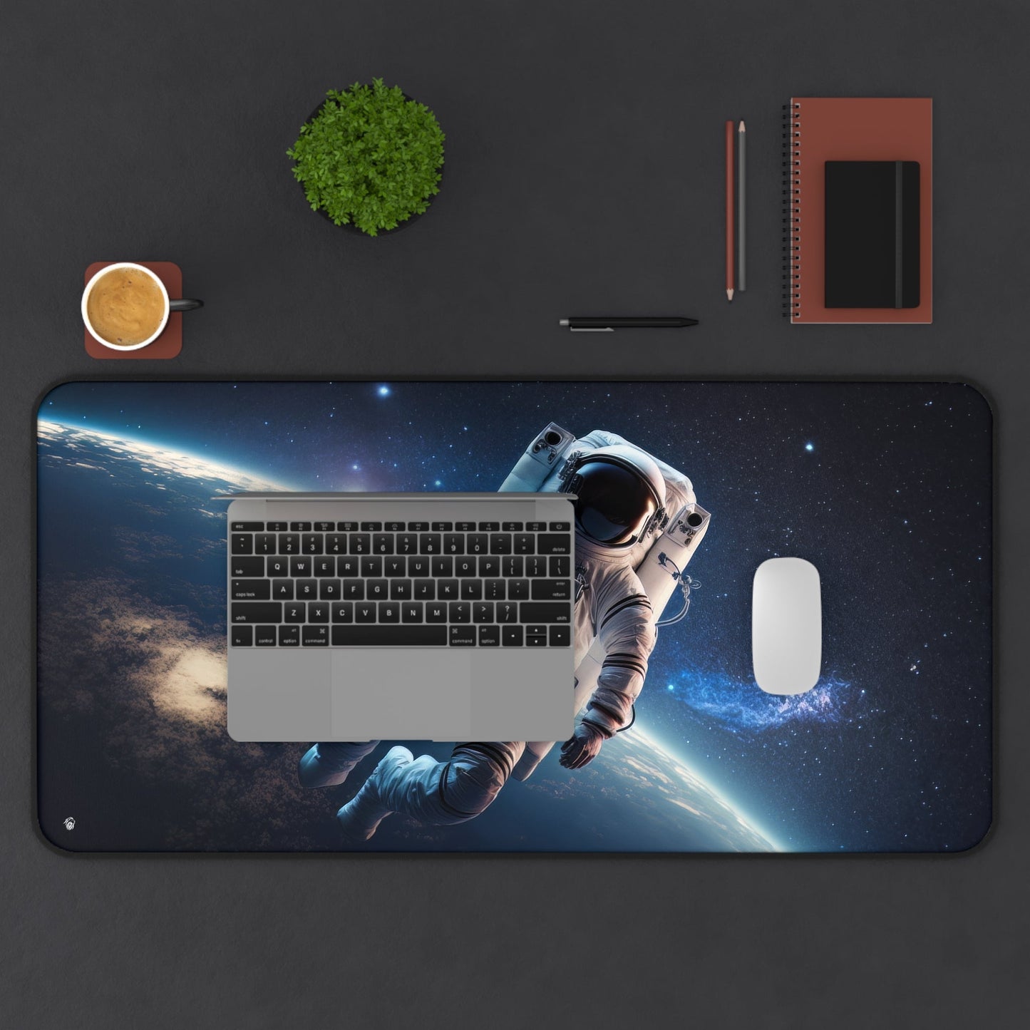 Starry Sky Astronaut Exploration xxl mouse pad of size 15 by 31 inches displayed on a desk