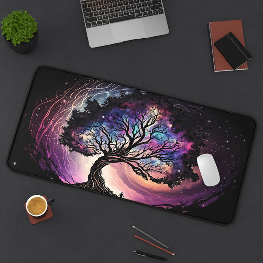 Purple Mystical Tree Imagery xxl mouse pad of size 15 by 31 inches displayed on a desk