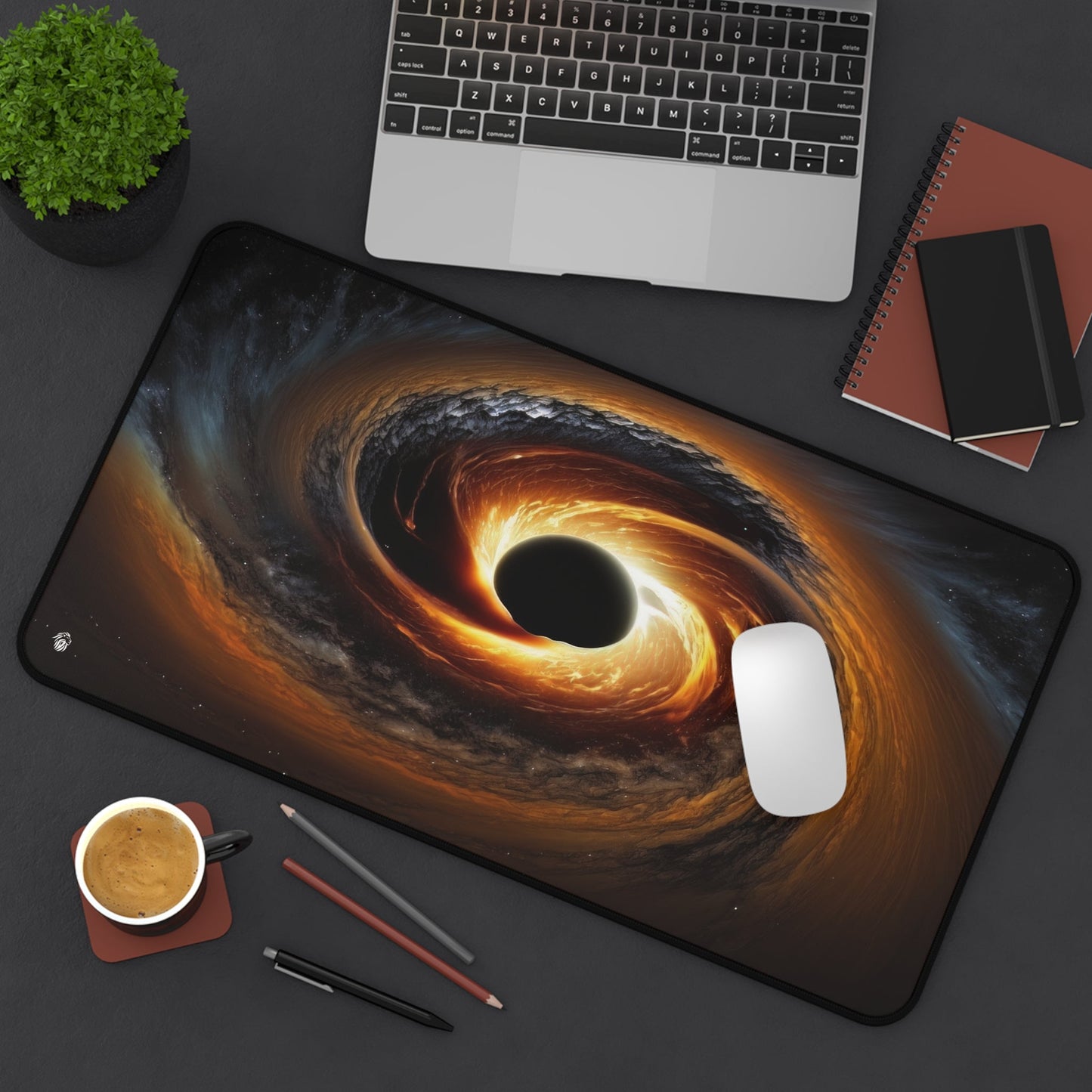 Galactic Black Hole Imagery xxl mouse pad of size 12 by 22 inches displayed on a desk