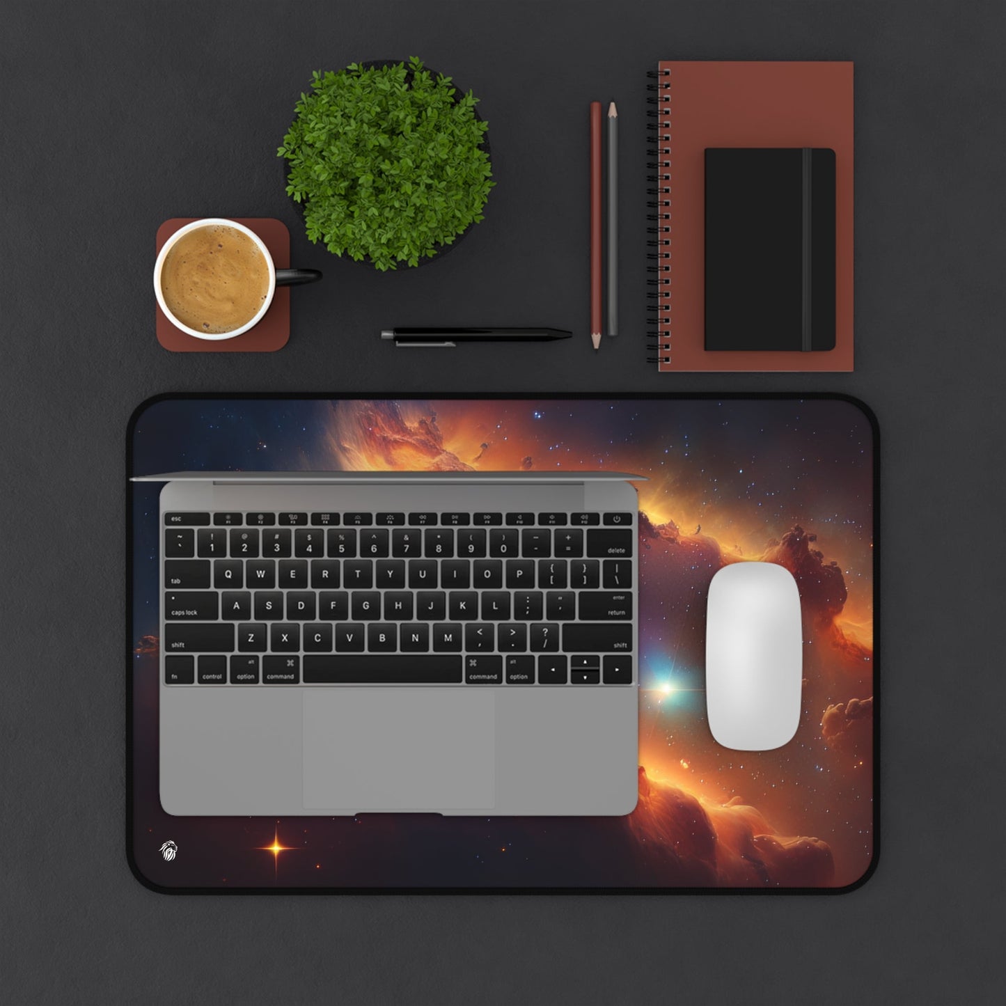 Vibrant Orange Galactic Print xxl mouse pad of size 12 by 18 inches displayed on a desk