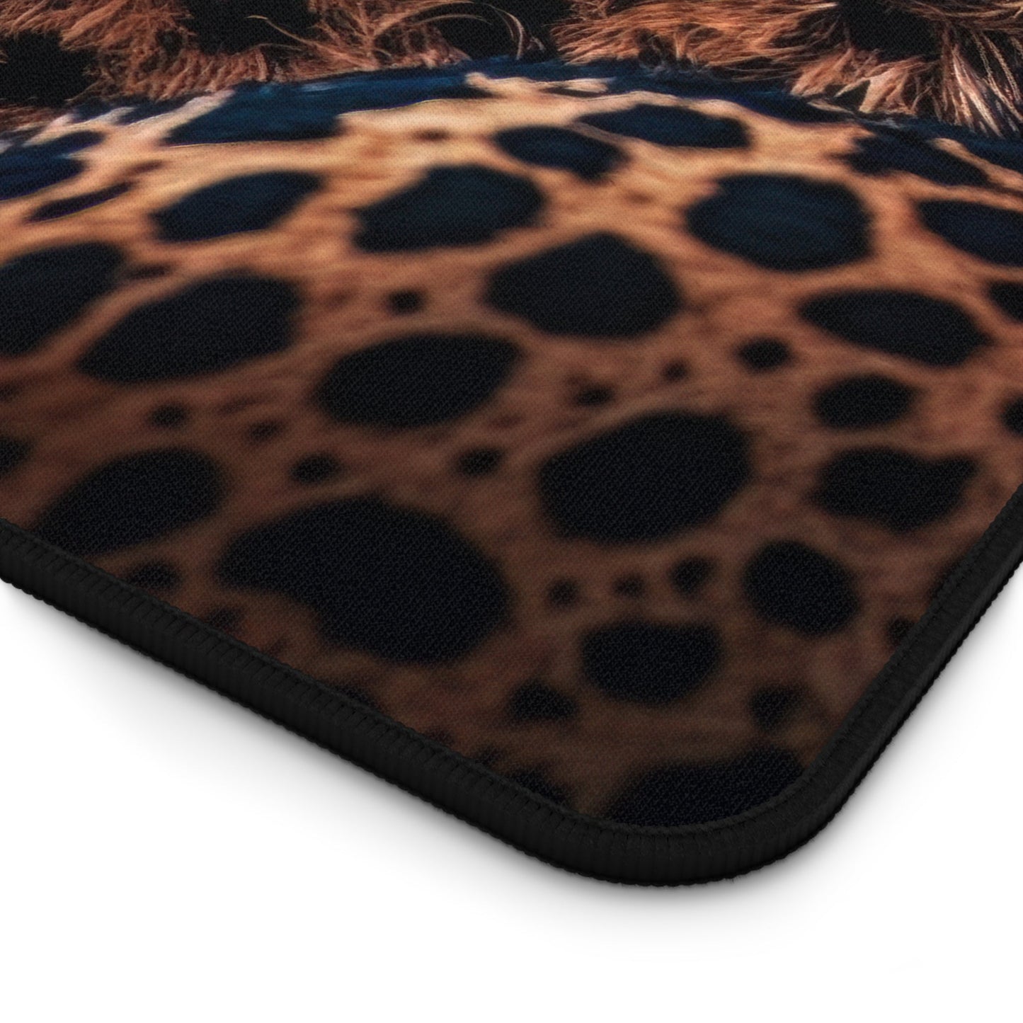 Close-up view of the front of the Exotic Cheetah Pattern xxl mouse pad