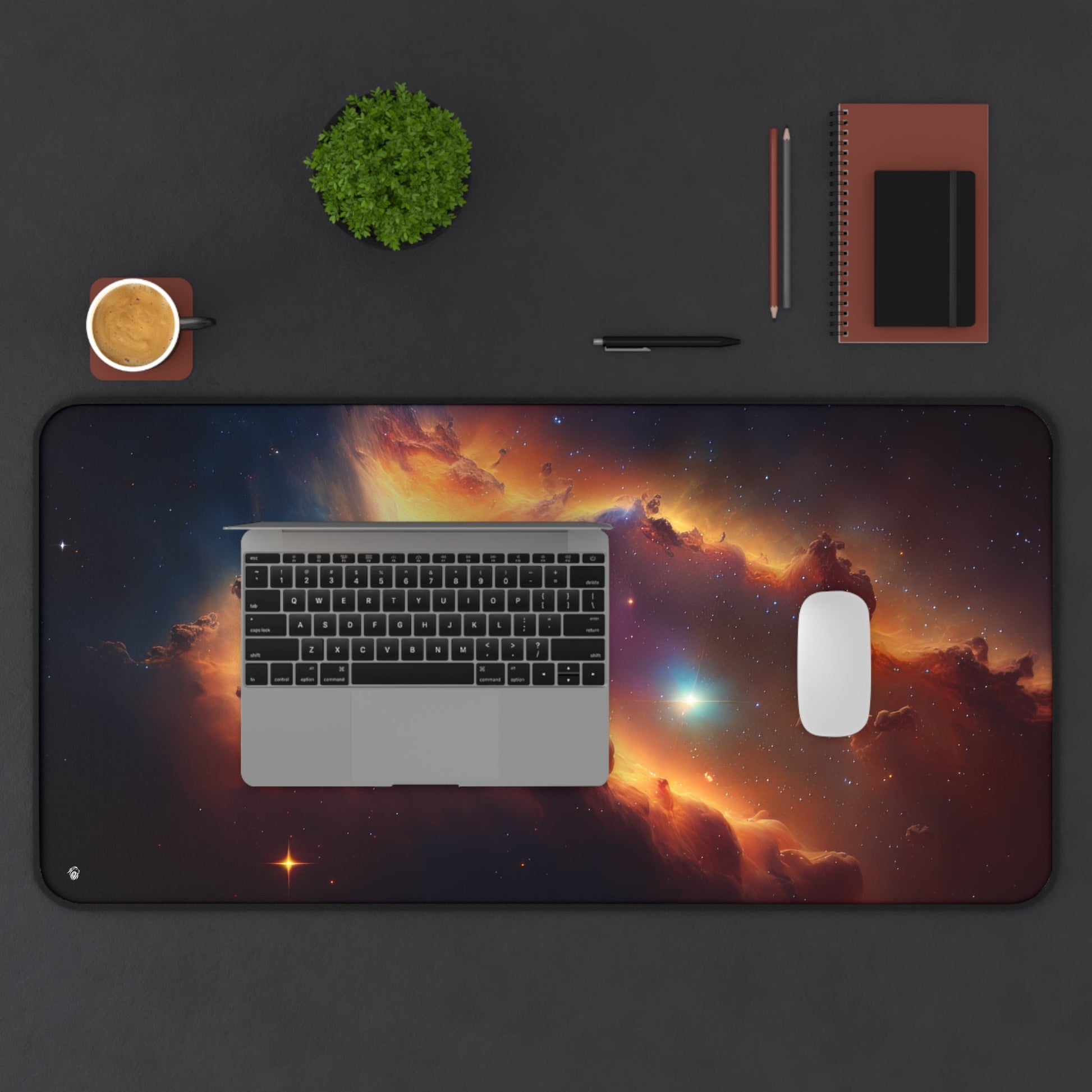 Vibrant Orange Galactic Print xxl mouse pad of size 15 by 31 inches displayed on a desk