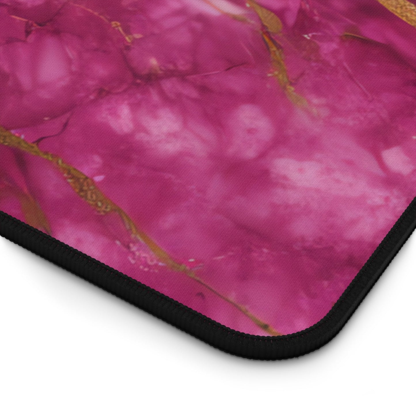 Close-up view of the front of the Fuchsia Marble with Gold Accents xxl mouse pad