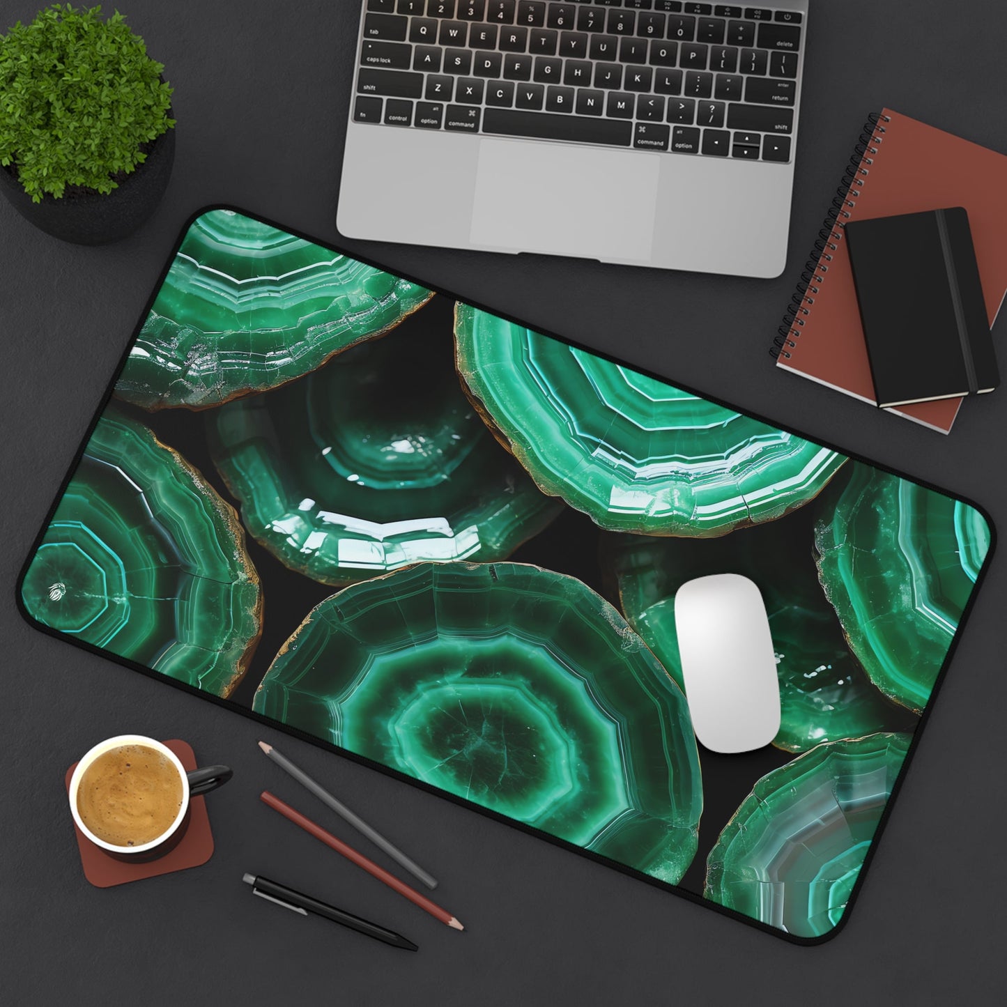 Deep Green, Emerald Crystal Geode xxl mouse pad of size 12 by 22 inches displayed on a desk