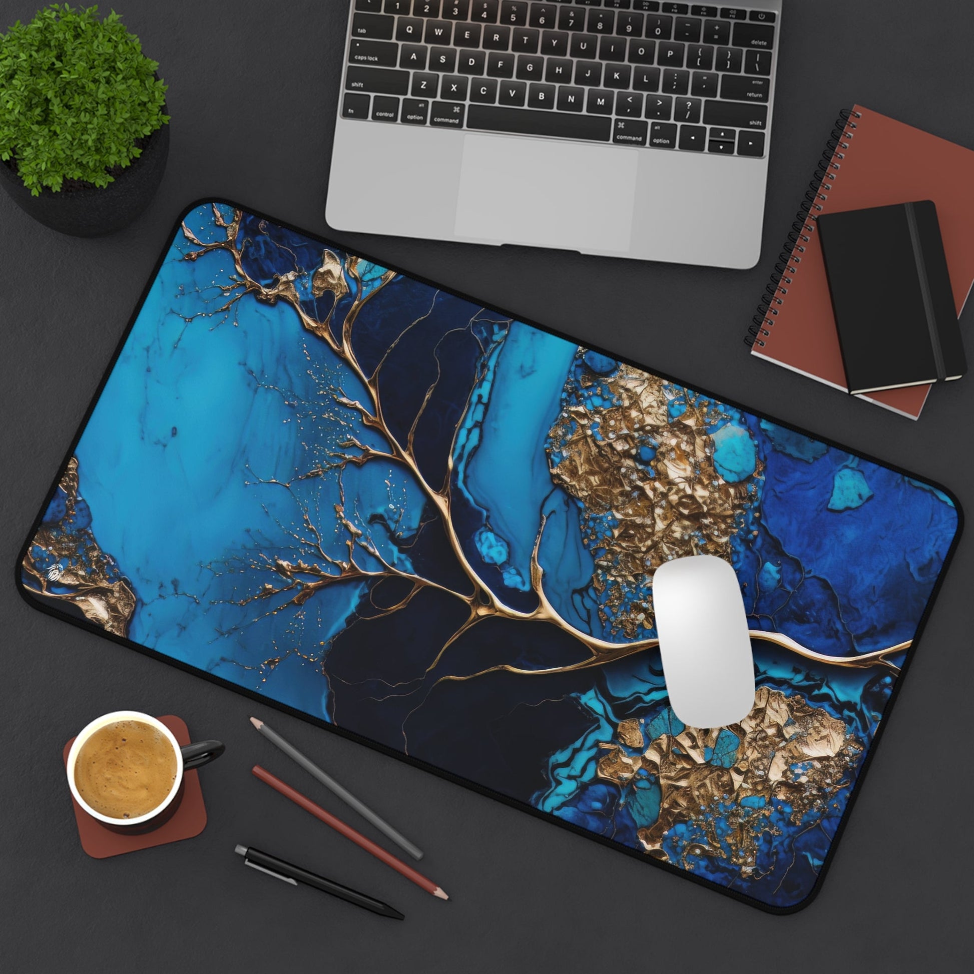 Rich Veined, Blue-Gold Marble xxl mouse pad of size 12 by 22 inches displayed on a desk