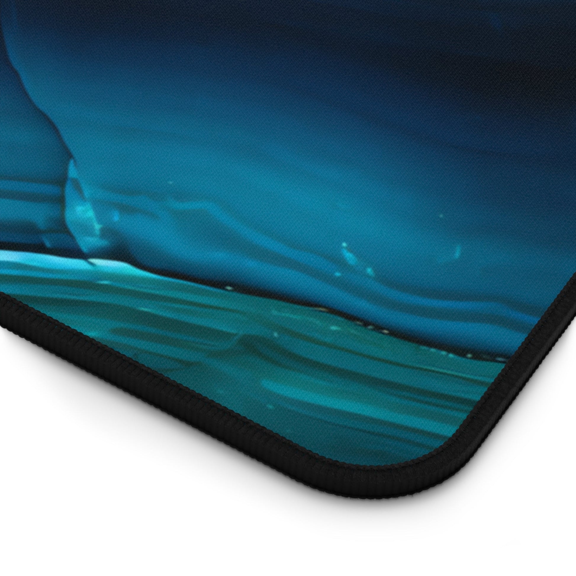 Close-up view of the front of the Cyan Blue Gemstone Pattern xxl mouse pad