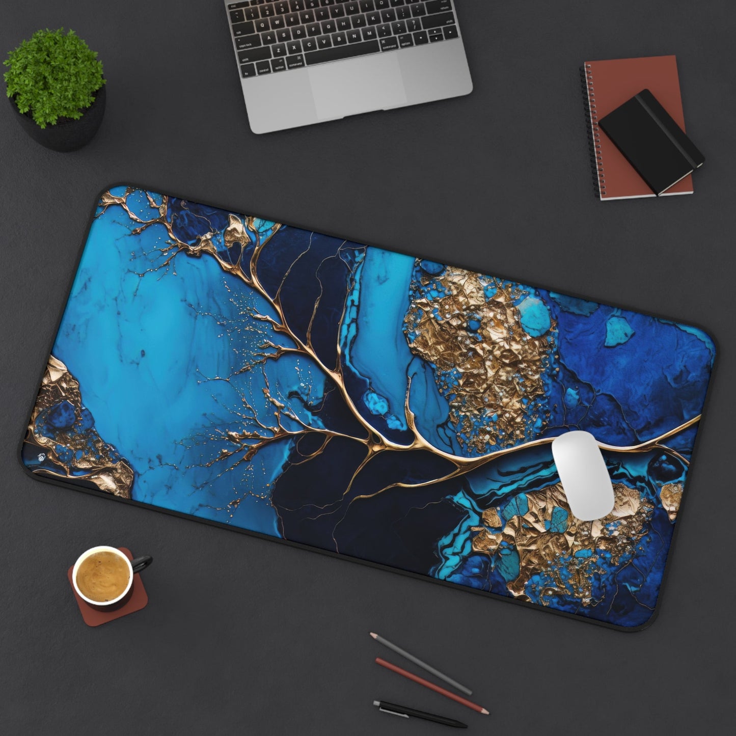 Rich Veined, Blue-Gold Marble xxl mouse pad of size 15 by 31 inches displayed on a desk