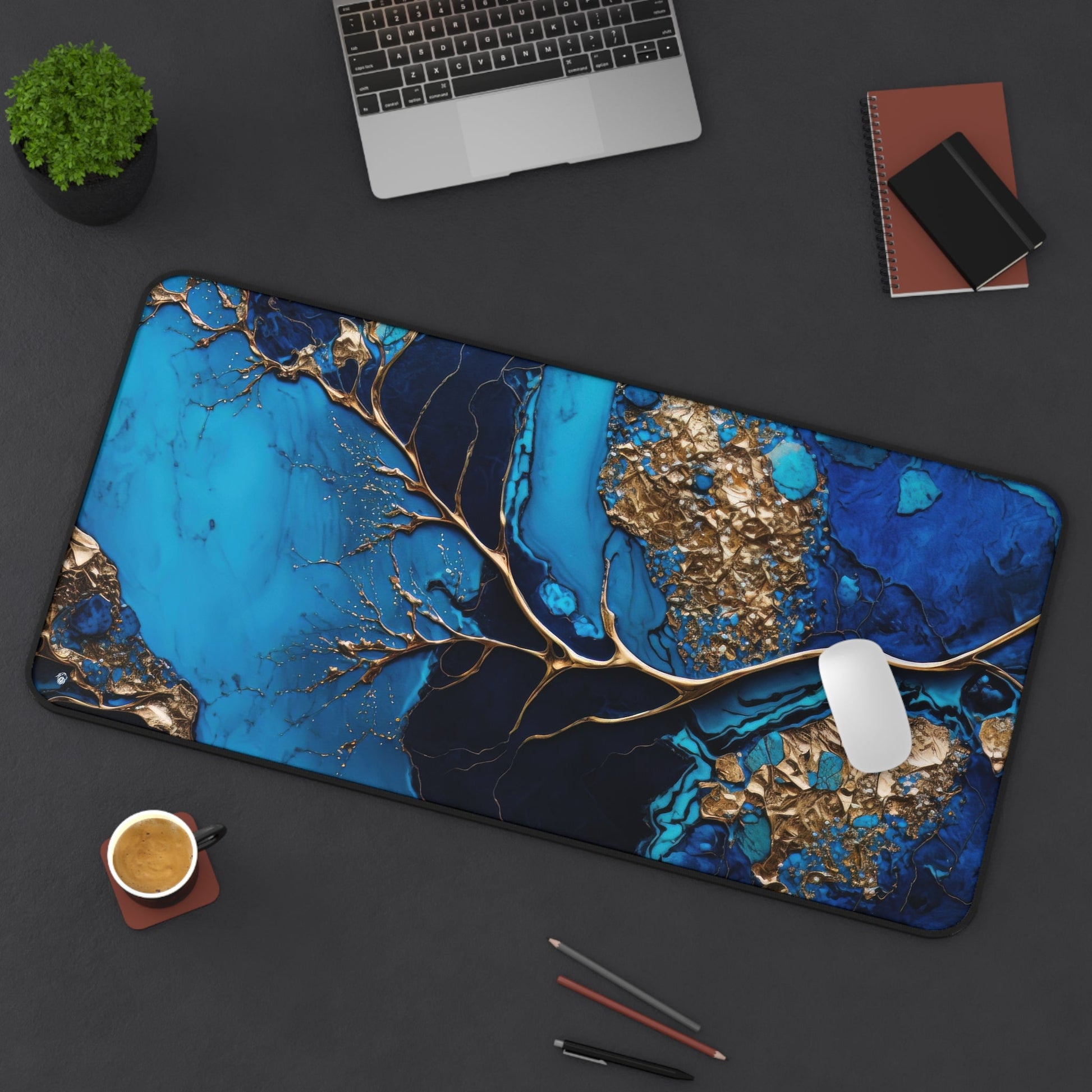 Rich Veined, Blue-Gold Marble xxl mouse pad of size 15 by 31 inches displayed on a desk