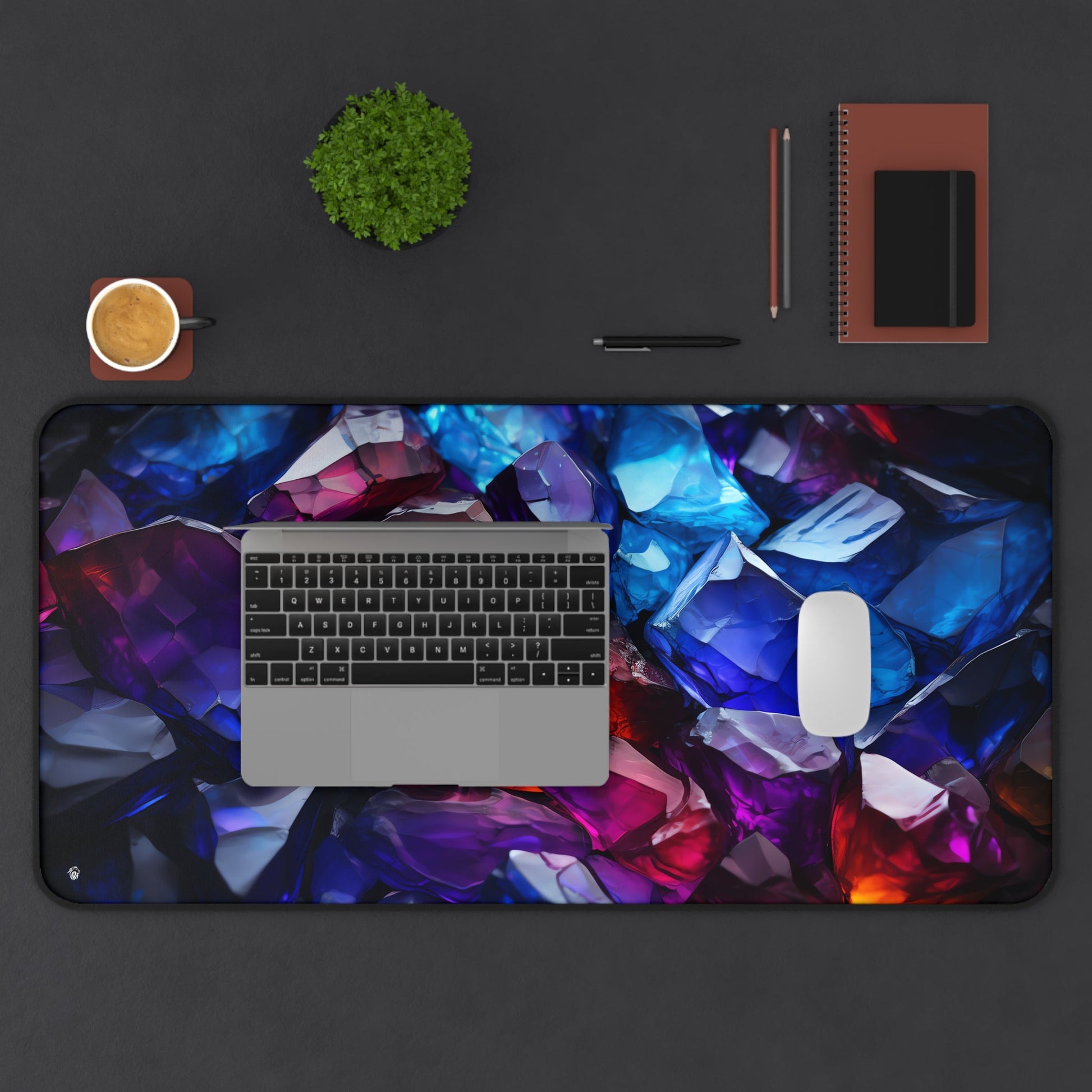 Vibrant Crystal Geode Pattern xxl mouse pad of size 15 by 31 inches displayed on a desk