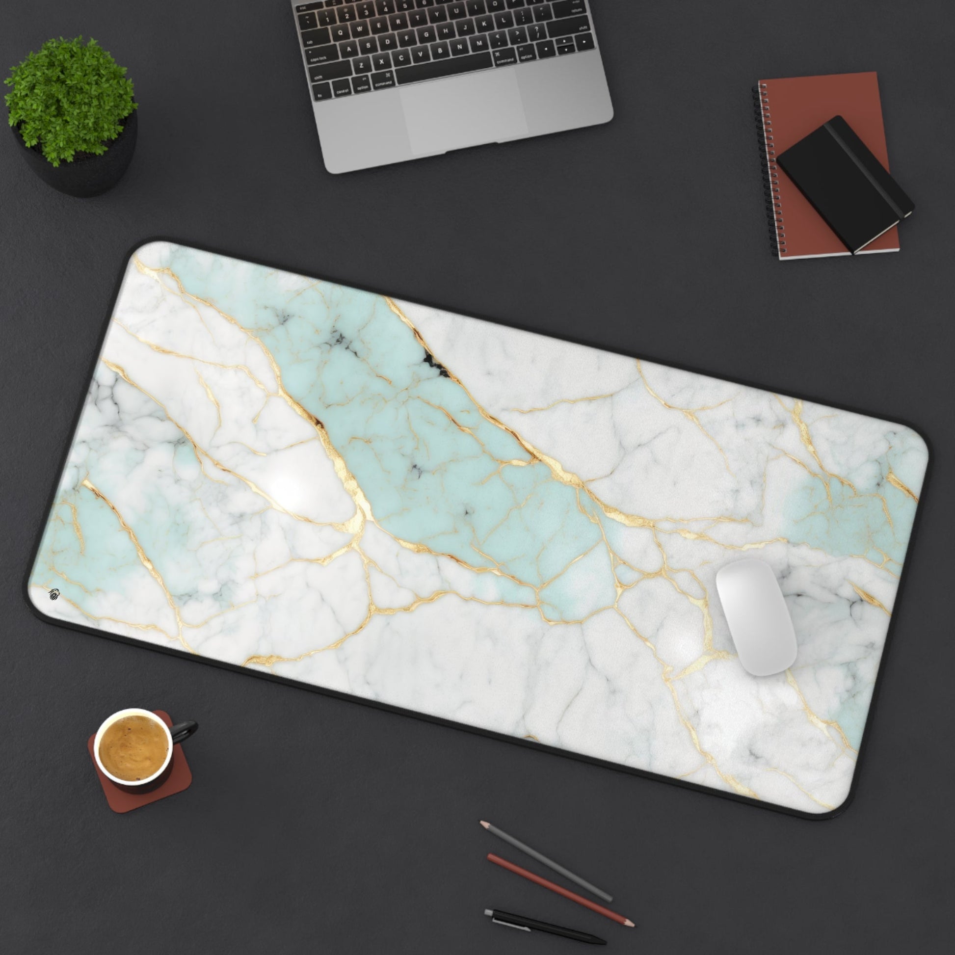 Aquamarine Marble with Gold Accents xxl mouse pad of size 15 by 31 inches displayed on a desk