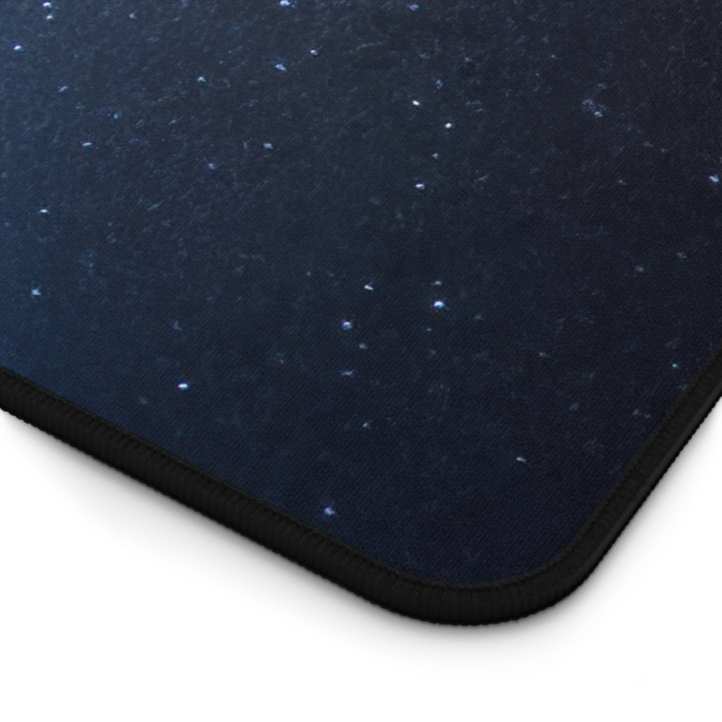 Close-up view of the front of the Starry Sky Astronaut Exploration xxl mouse pad