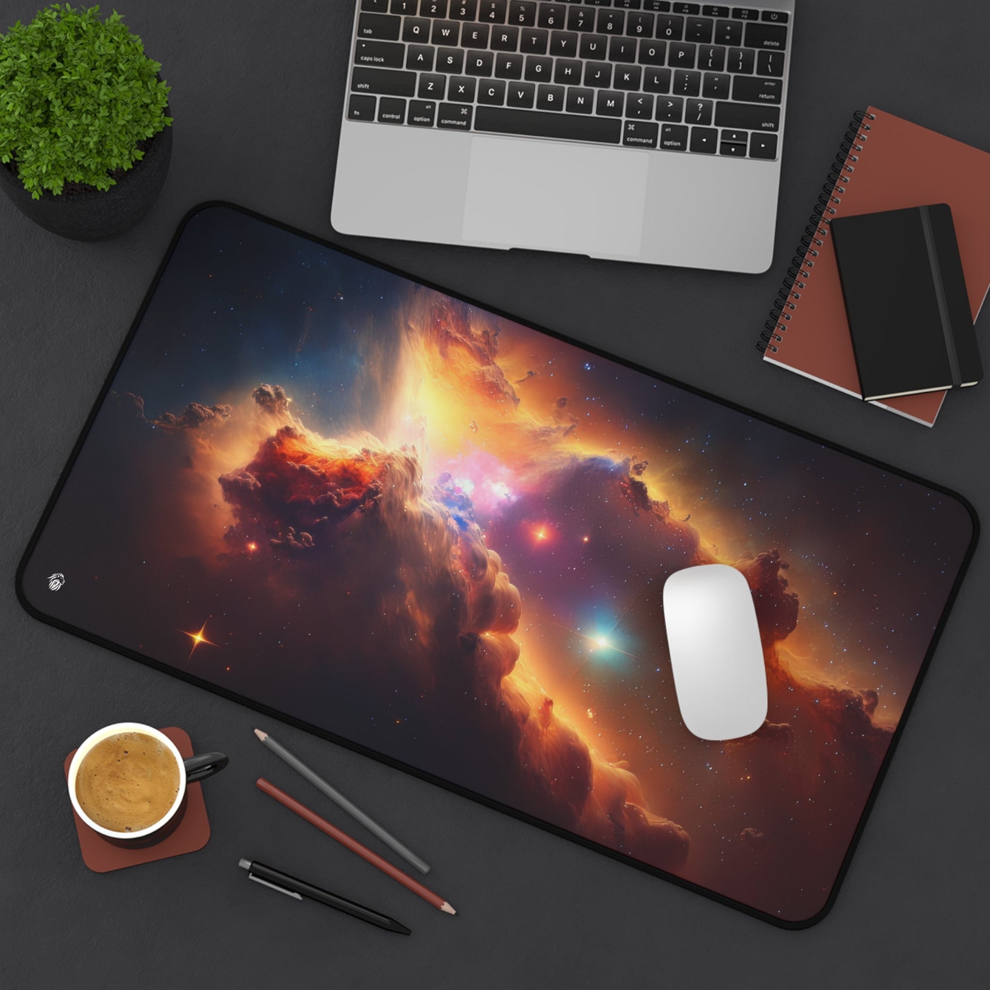 Vibrant Orange Galactic Print xxl mouse pad of size 12 by 22 inches displayed on a desk