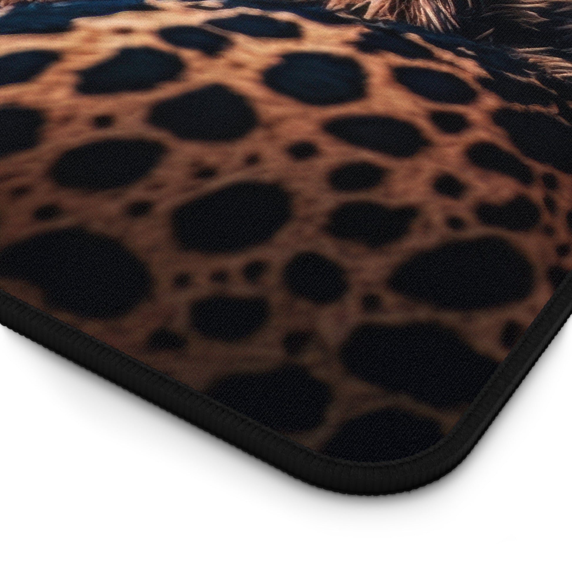 Close-up view of the front of the Exotic Cheetah Pattern xxl mouse pad