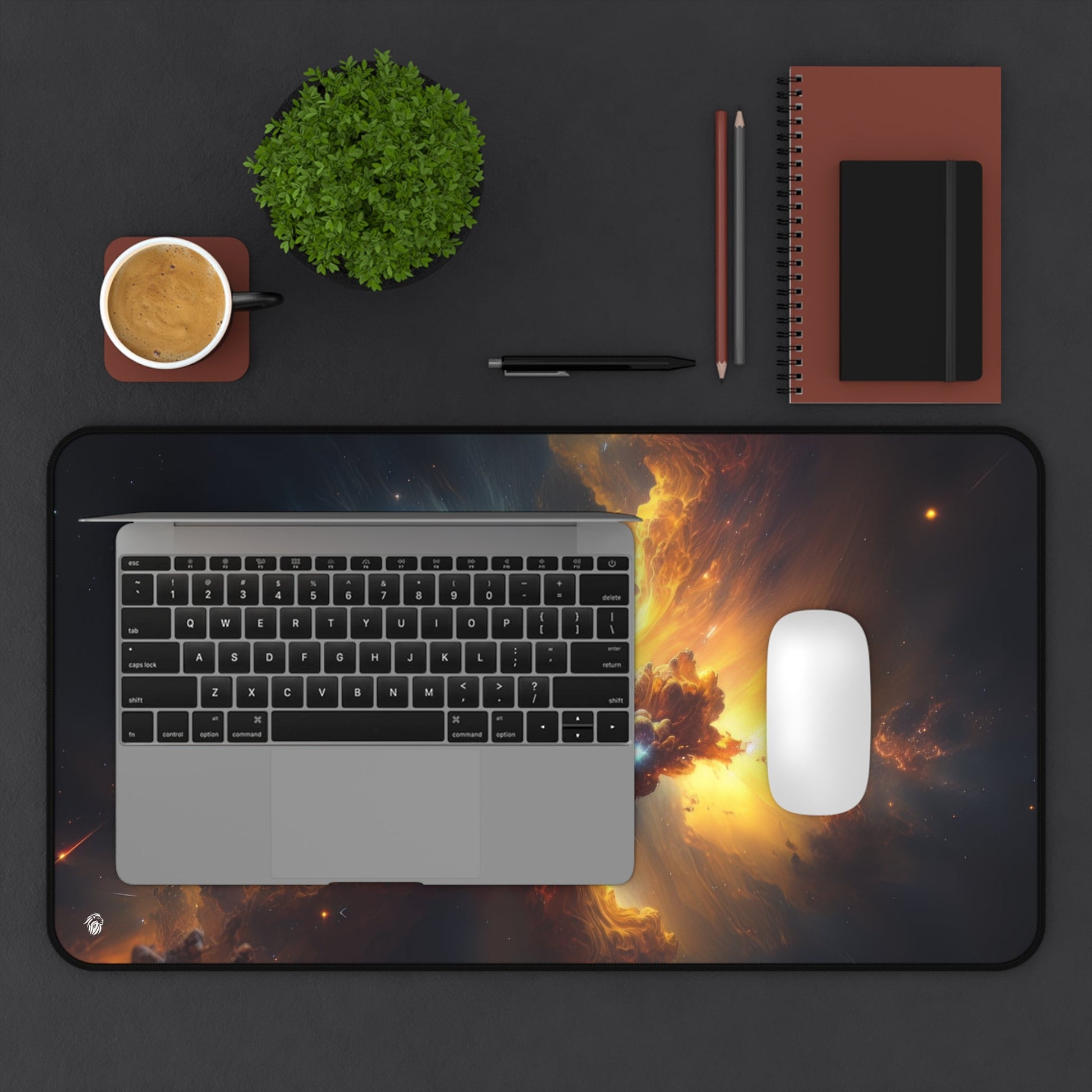 Vivid Orange Nebula Imagery xxl mouse pad of size 12 by 22 inches displayed on a desk