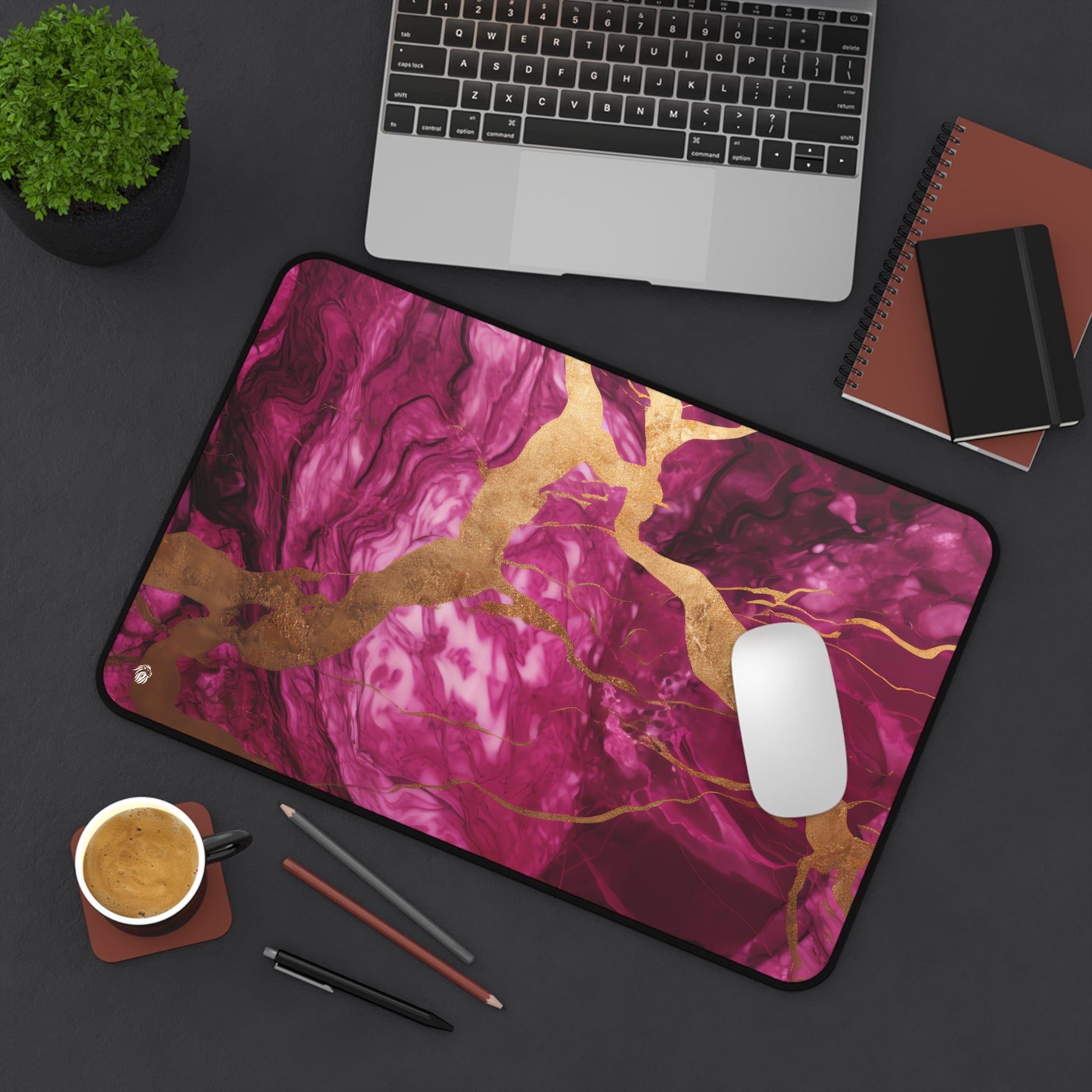 Fuchsia Marble with Gold Accents xxl mouse pad of size 12 by 18 inches displayed on a desk