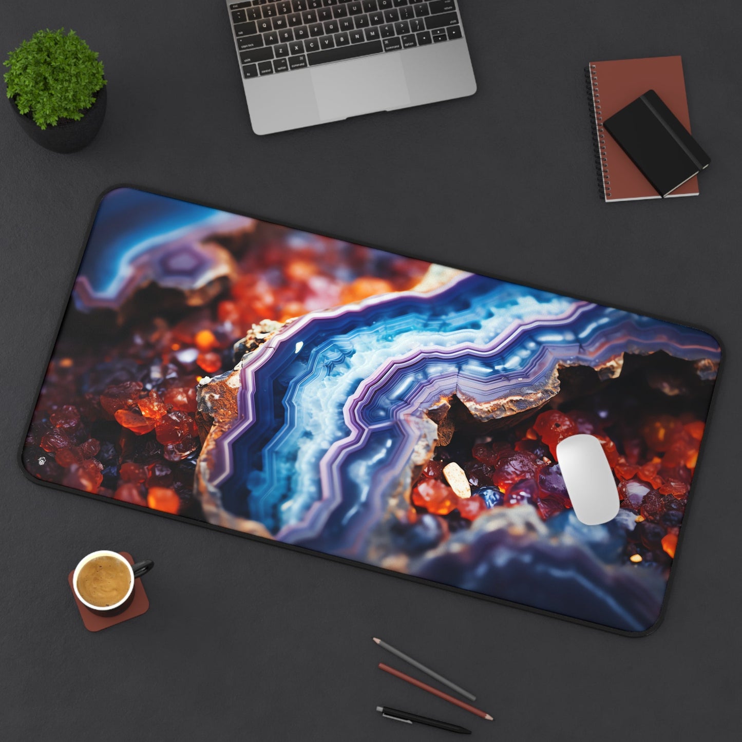 Vibrant, Geode-patterned, Multicolored xxl mouse pad of size 15 by 31 inches displayed on a desk