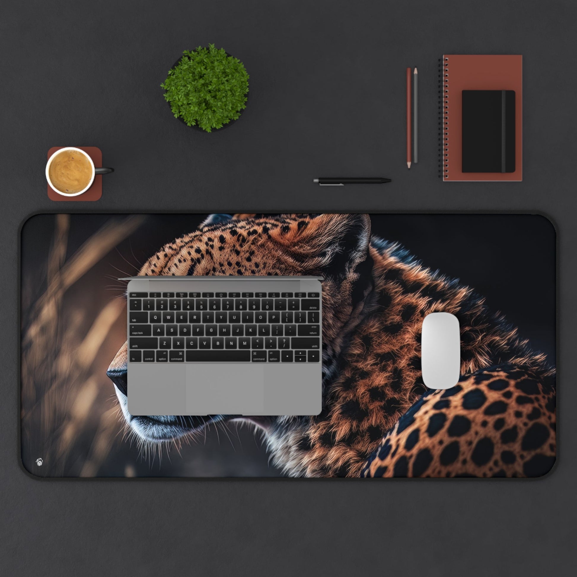 Exotic Cheetah Pattern xxl mouse pad of size 15 by 31 inches displayed on a desk