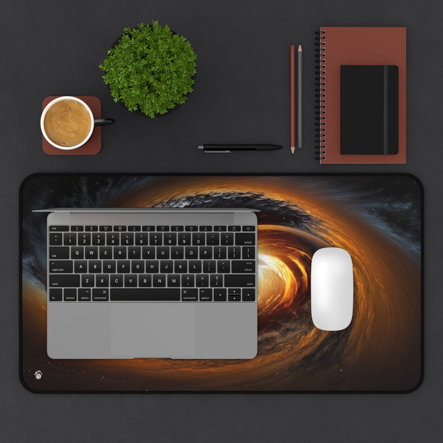 Galactic Black Hole Imagery xxl mouse pad of size 12 by 22 inches displayed on a desk