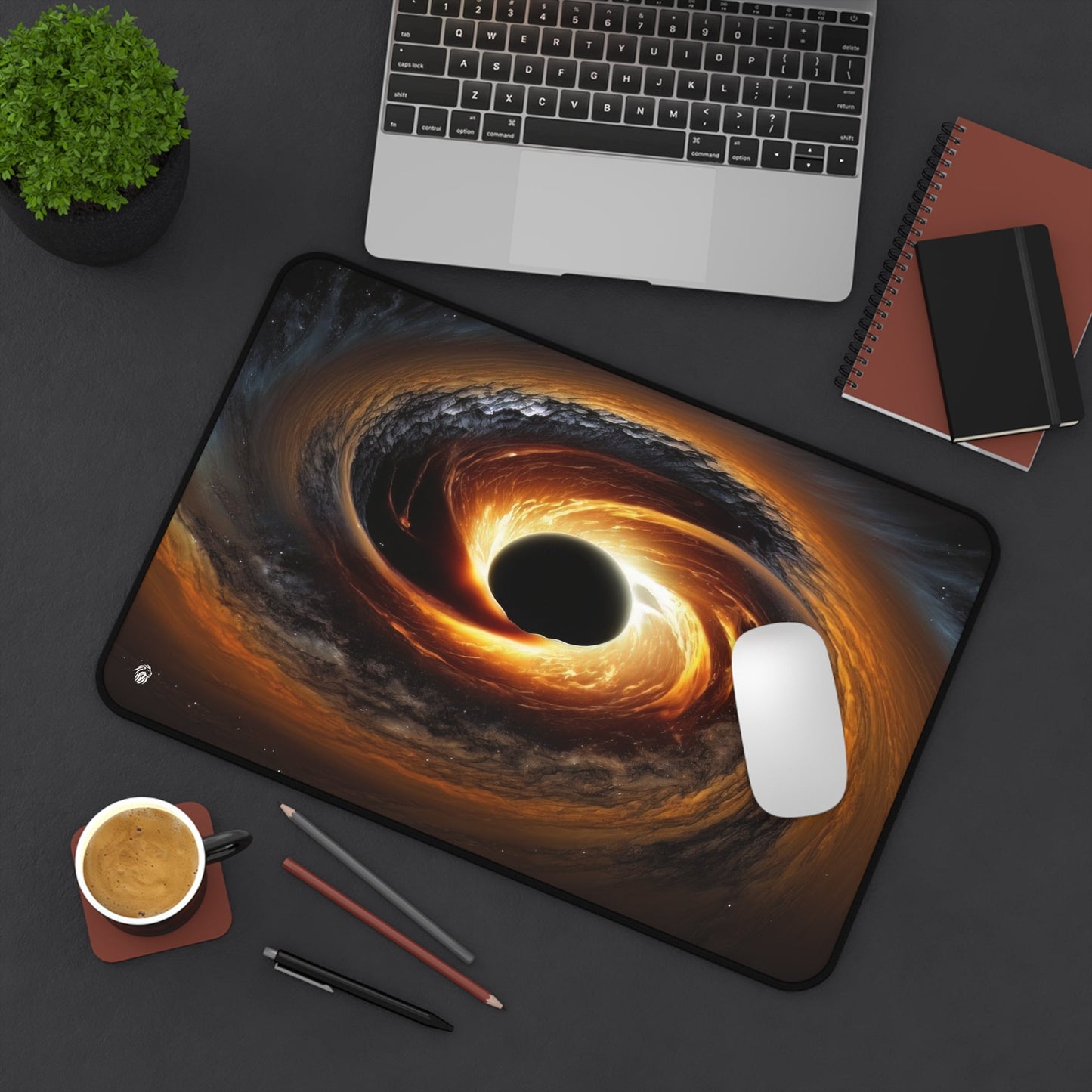 Galactic Black Hole Imagery xxl mouse pad of size 12 by 18 inches displayed on a desk