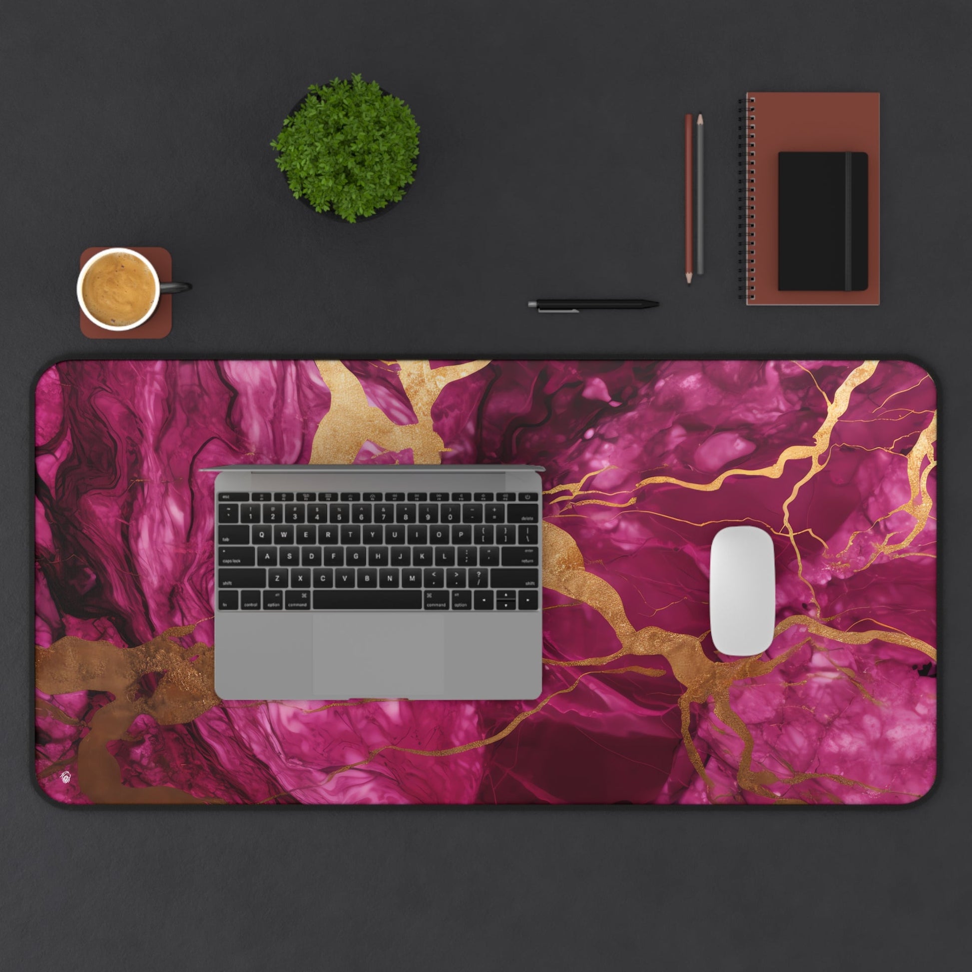 Fuchsia Marble with Gold Accents xxl mouse pad of size 15 by 31 inches displayed on a desk