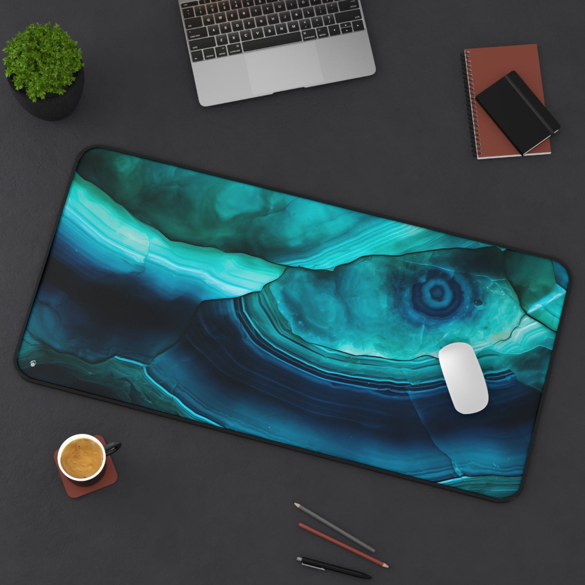 Cyan Blue Gemstone Pattern xxl mouse pad of size 15 by 31 inches displayed on a desk